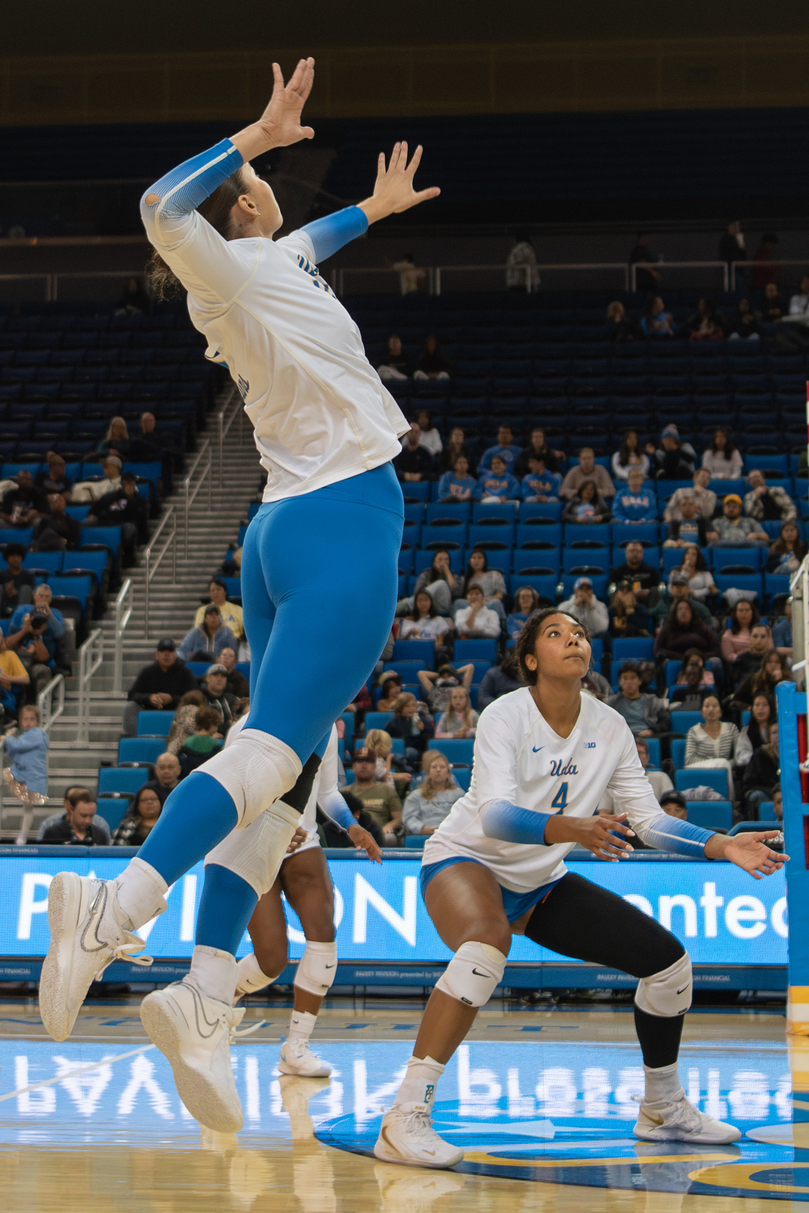 Freshman outside hitter Eliana Urzua jumps to hit the ball. (Karla Cardenas-Felipe/Daily Bruin staff)
