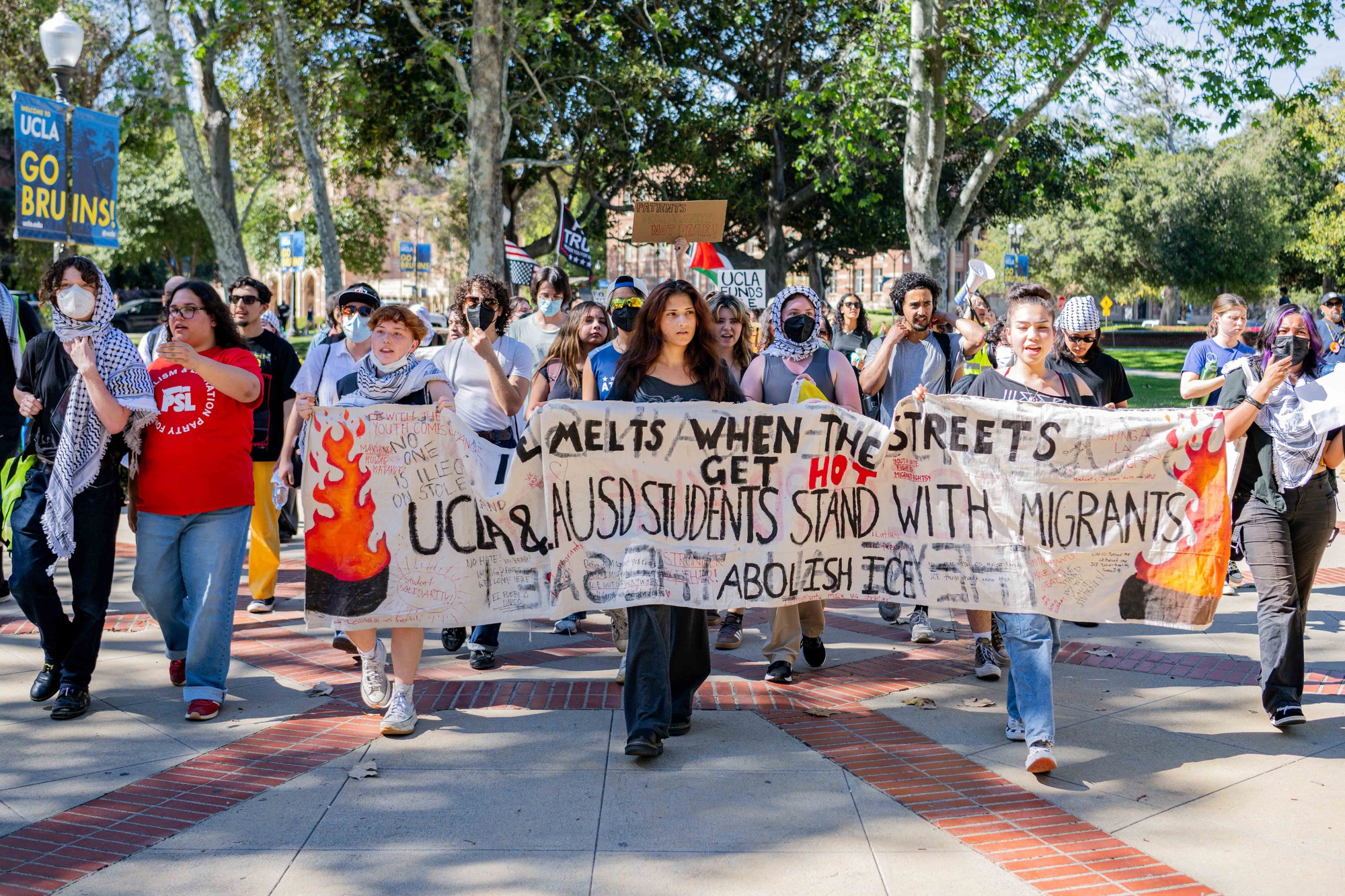 Student groups host walkout at UCLA to protest ICE, support migrant workers