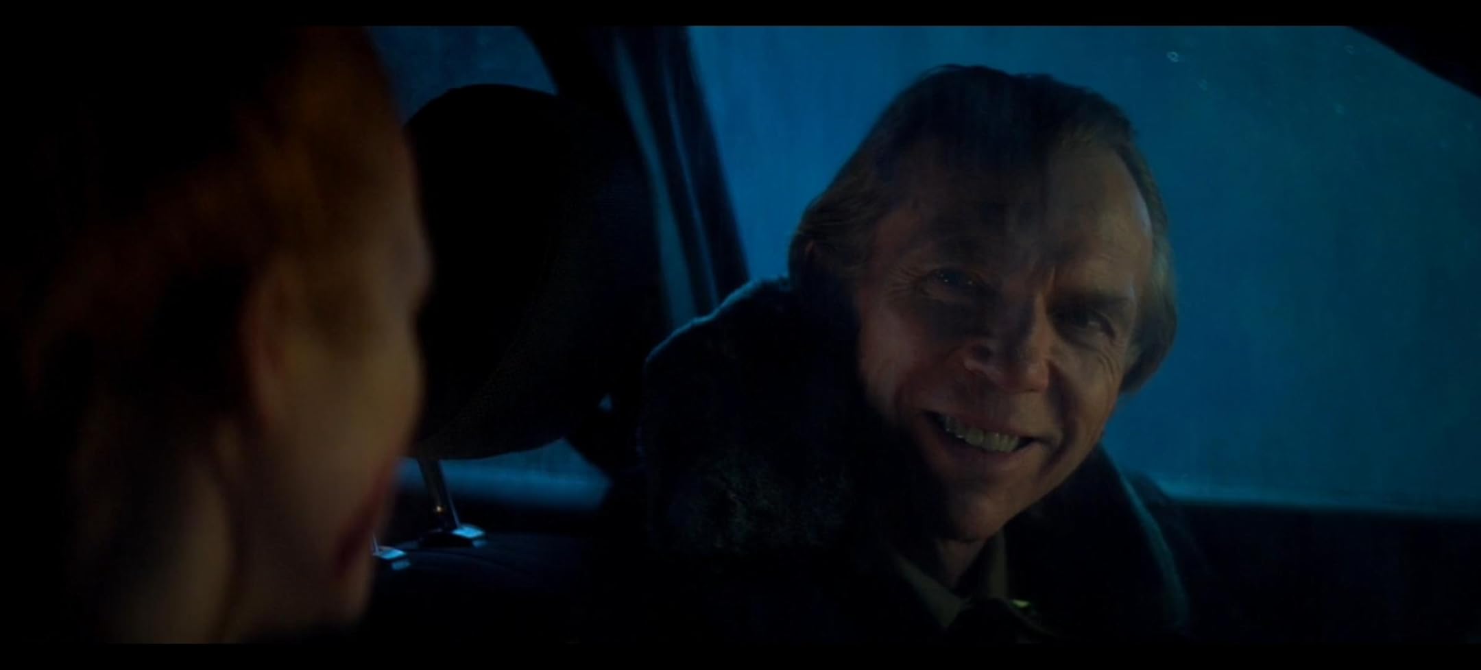 Sheriff Howard Rotter (Richard Brake) is pictured staring at Maya (Petsch) and smiling. “The Strangers: Chapter 3” was directed by Renny Harlin. (Courtesy of Lionsgate)