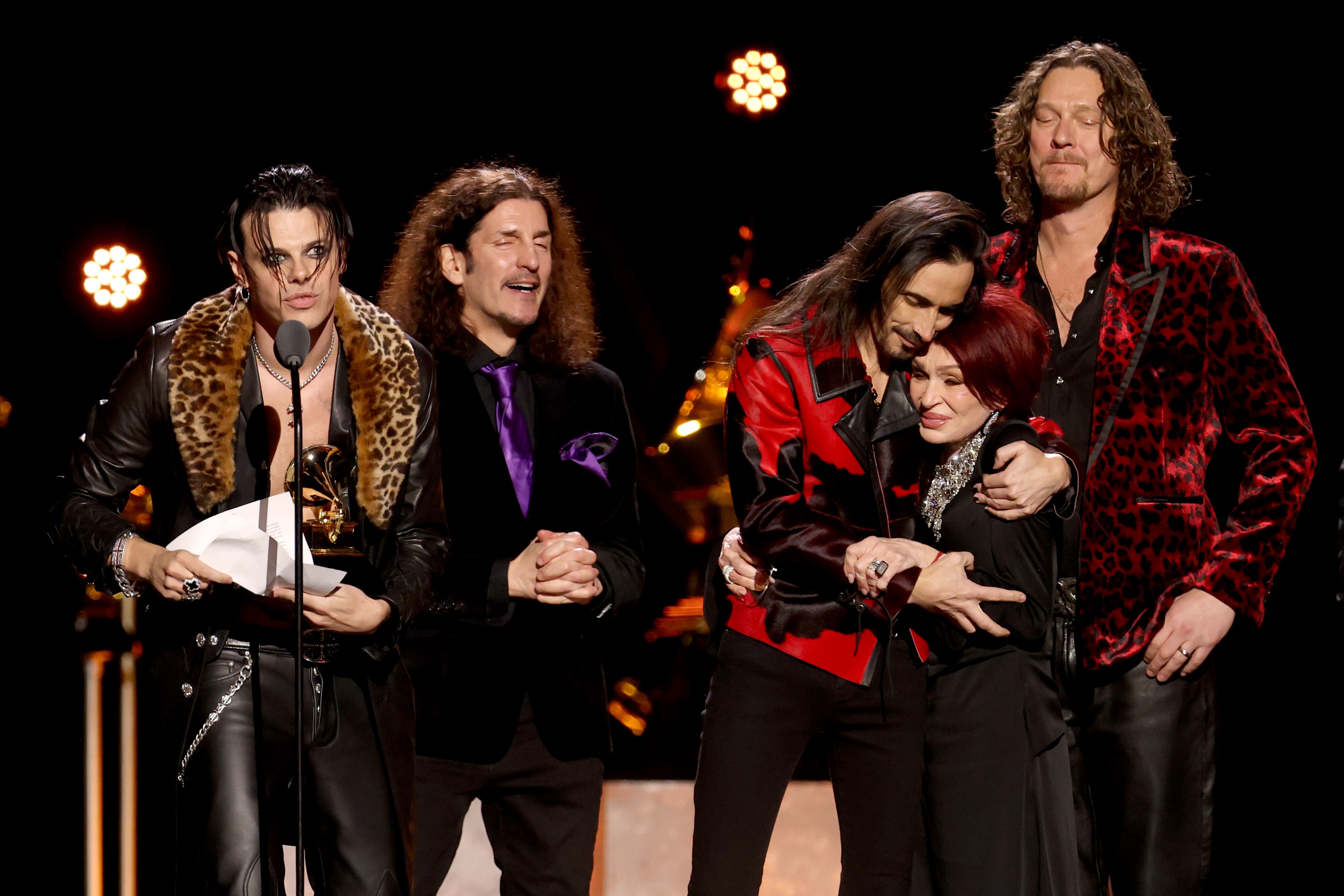 Pictured, from left to right, are YUNGBLUD, Frank Bello, Nuno Bettencourt, Sharon Osbourne and Adam Wakeman. The musicians won the Best Rock Performance Grammy for their live cover of the Black Sabbath song "Changes."(Courtesy of Matt Winkelmeyer/Getty Images for The Recording Academy)