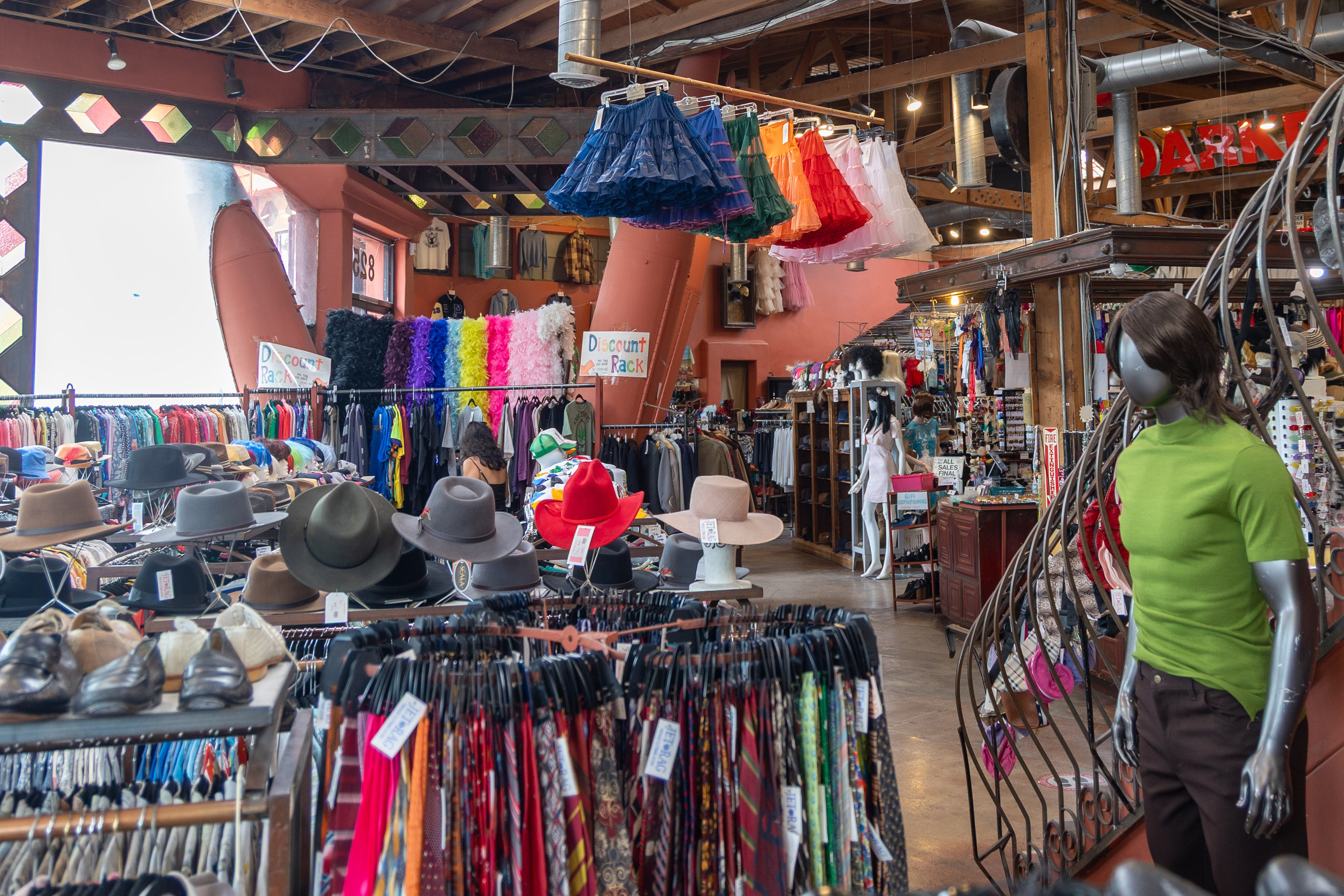 Mannequins and racks of clothing and hats line the backstage of "Nobody Wants This." While the tour centers on the television show, it also showcases various underground elements of LA. (Chenrui Zhang/Daily Bruin staff)