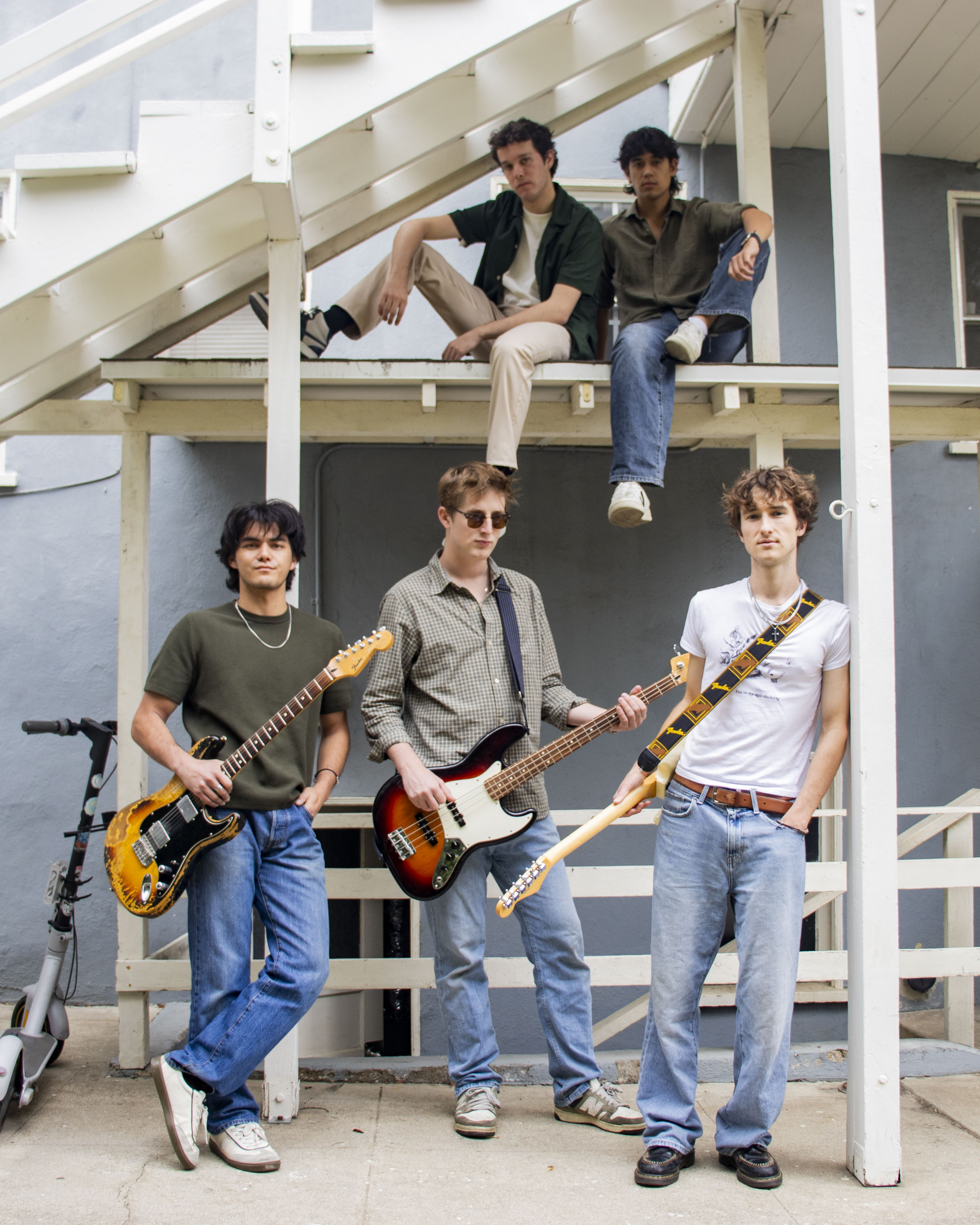 From left to right, Gottesman and Estes pose in an elevated platform, with Breister, Harris and Wright standing below them. The band said their sound is influenced by groups like One Direction and 5 Seconds of Summer, with an indie rock spin. (Ruby Galbraith/Daily Bruin staff)