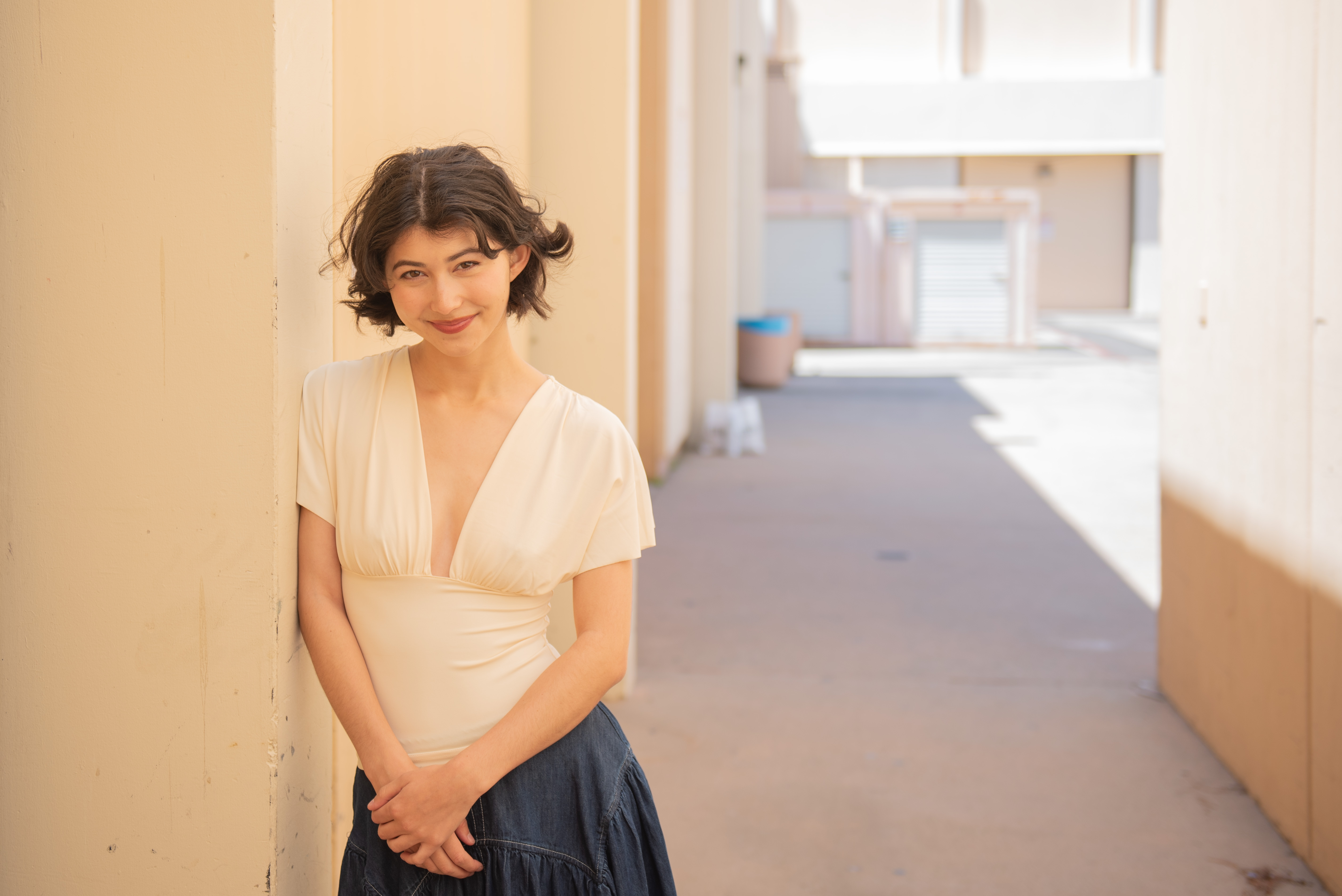 Hedican leans against a wall. The actor-director-producer said she hopes to stay in Los Angeles after graduation unless she decides to pursue graduate school in New York. (Chenrui Zhang/Daily Bruin staff)