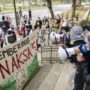 Members of Students for Justice in Palestine at UCLA protest outside Murphy Hall, where the offices of UCLA administrators are located. About 35 people marched on campus Friday to commemorate the 59th anniversary of the 1967 Naksa. (Andrew Ramiro Diaz/Photo editor)