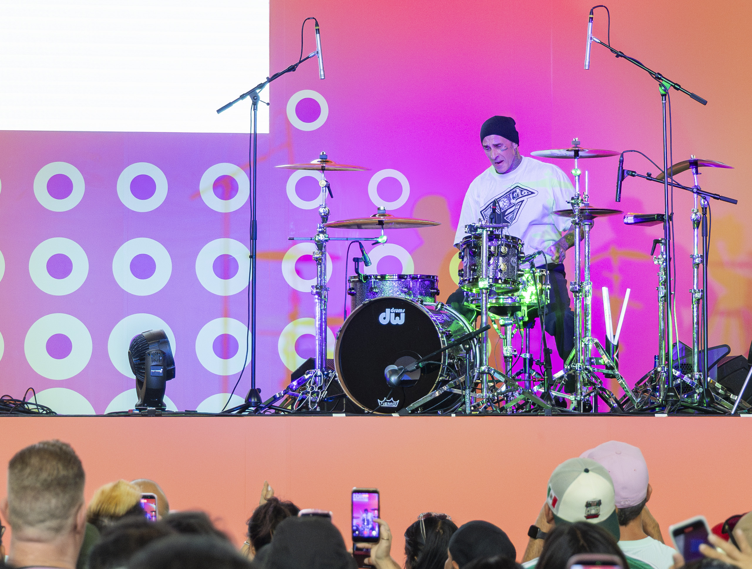 Travis Barker, an American musician, songwriter and music producer, performs at the Los Angeles World Cup 26 Fan Zone. The drummer for the rock band Blink-182 was among many of the event's performers. (Chenrui Zhang/Daily Bruin staff)