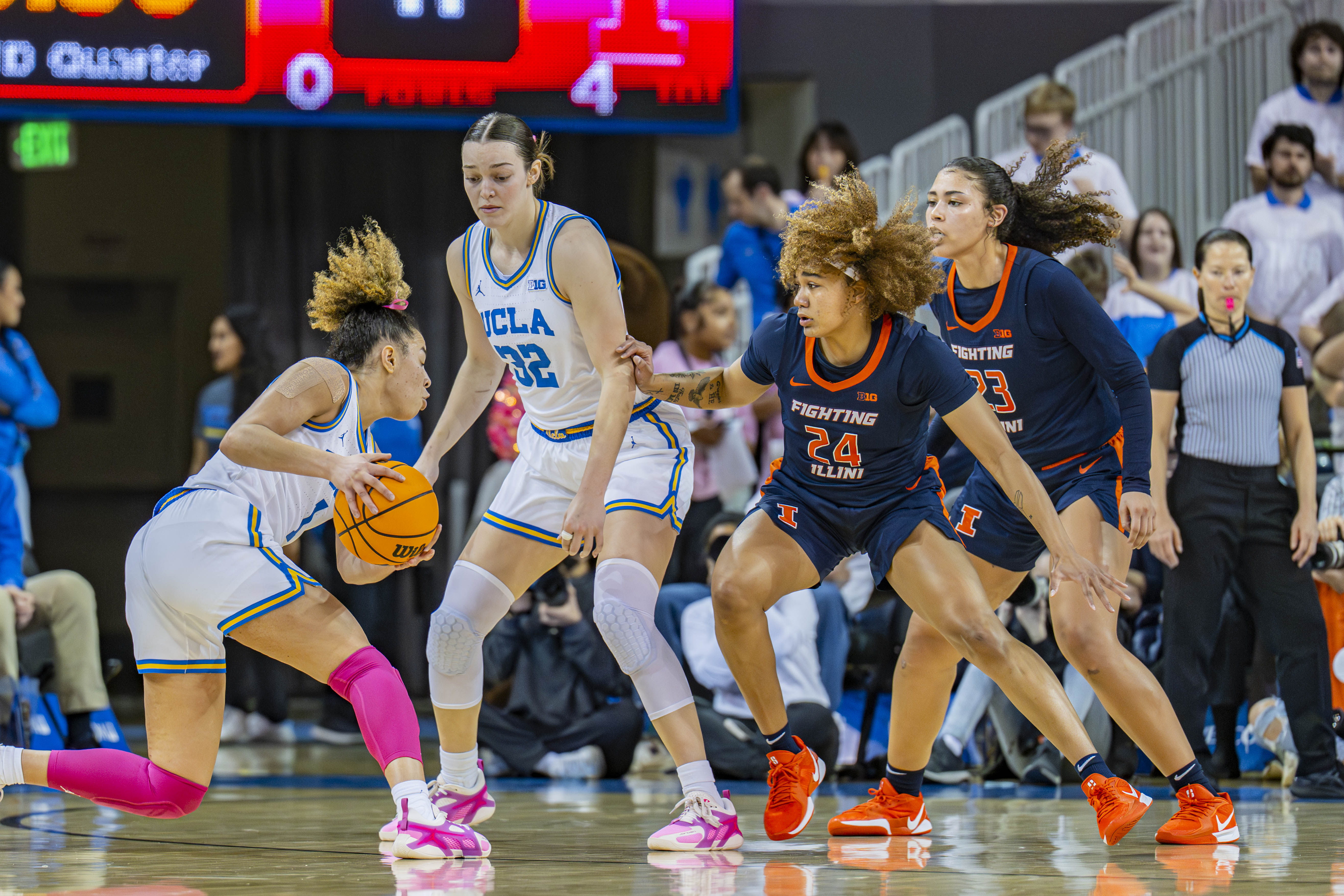 UCLA's Kiki Rice faces up against the Illinois defense. The Fighting Illini are returning their five leading scorers from the 2025-26 season. (Daily Bruin file photo)