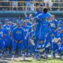 UCLA baseball celebrates in front of its dugout after a home run. With a flurry of draft-eligible juniors and seniors, the 2027 Bruins may look very different from their 2026 rendition. (Kai Dizon/Assistant Photo editor)