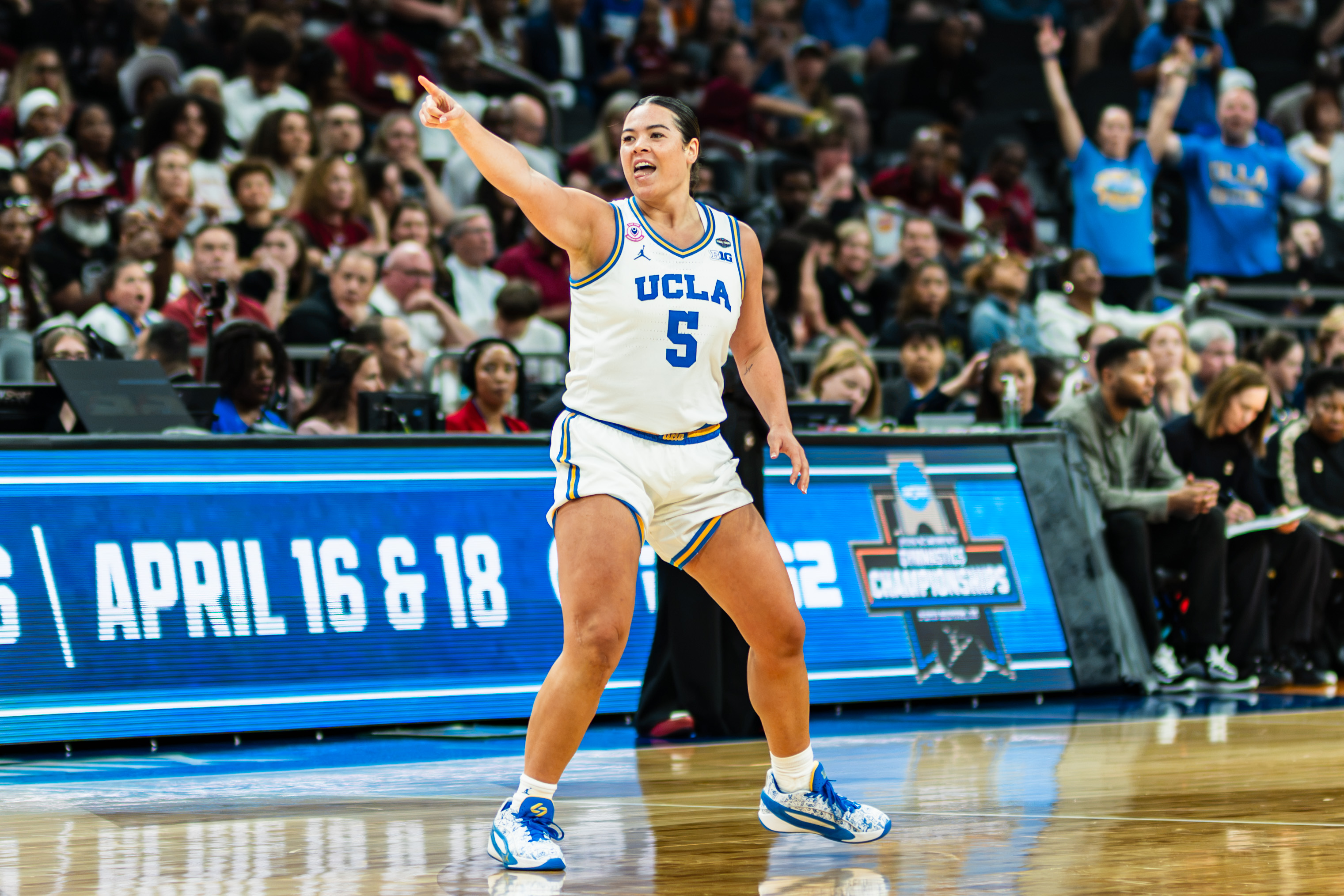 Former Bruin guard Charlisse Leger-Walker points down the court. Leger-Walker plays for the Connecticut Sun after being selected by them in the second round of the 2026 WNBA Draft.
(Daily Bruin file photo)