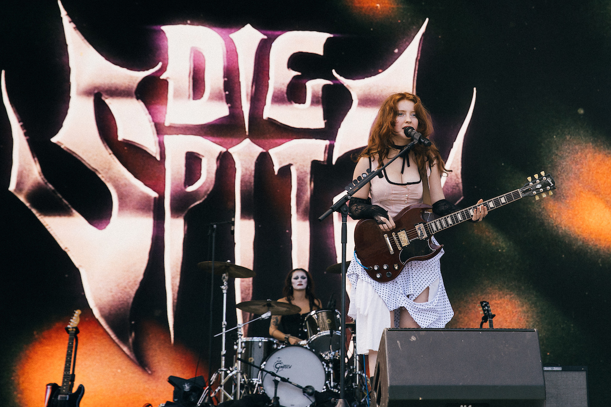 A couple of members of Die Spitz stand on the Marigold stage. The four-piece girl group from Austin, Texas, brought a new era of hardcore rock and grunge to the festival. (Courtesy of okaynicolita)
