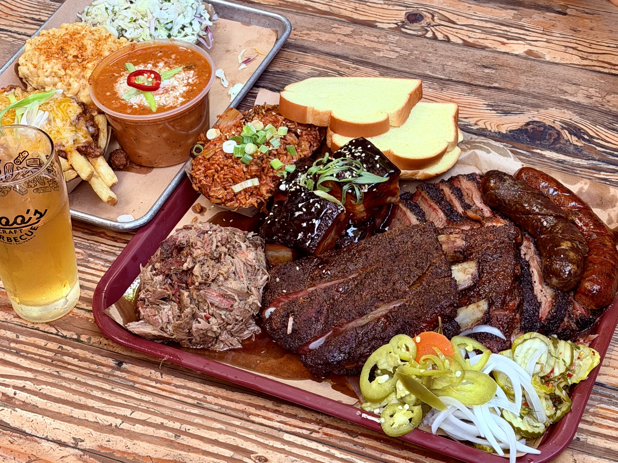 "The Meat Sweats" platter from Moo&squot;s Craft Barbecue is pictured. The restaurant is lauded for having some of the best barbecue in Los Angeles, having won consecutive Michelin Bib Gourmand awards and James Beard Award semifinalist recognition. (Courtesy of Eric Allan Kramer)