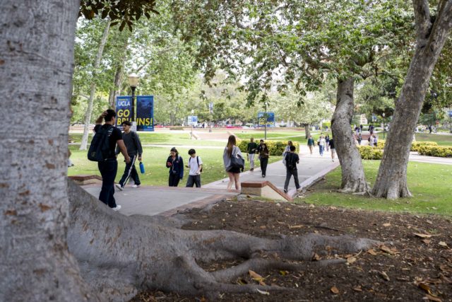 Students walk on UCLA’s campus. UCLA’s head of strategic communications asked a court Wednesday to block the UC Board of Regents from releasing a report that her lawyers allege would damage her reputation. (Crystal Tompkins/Daily Bruin senior staff)