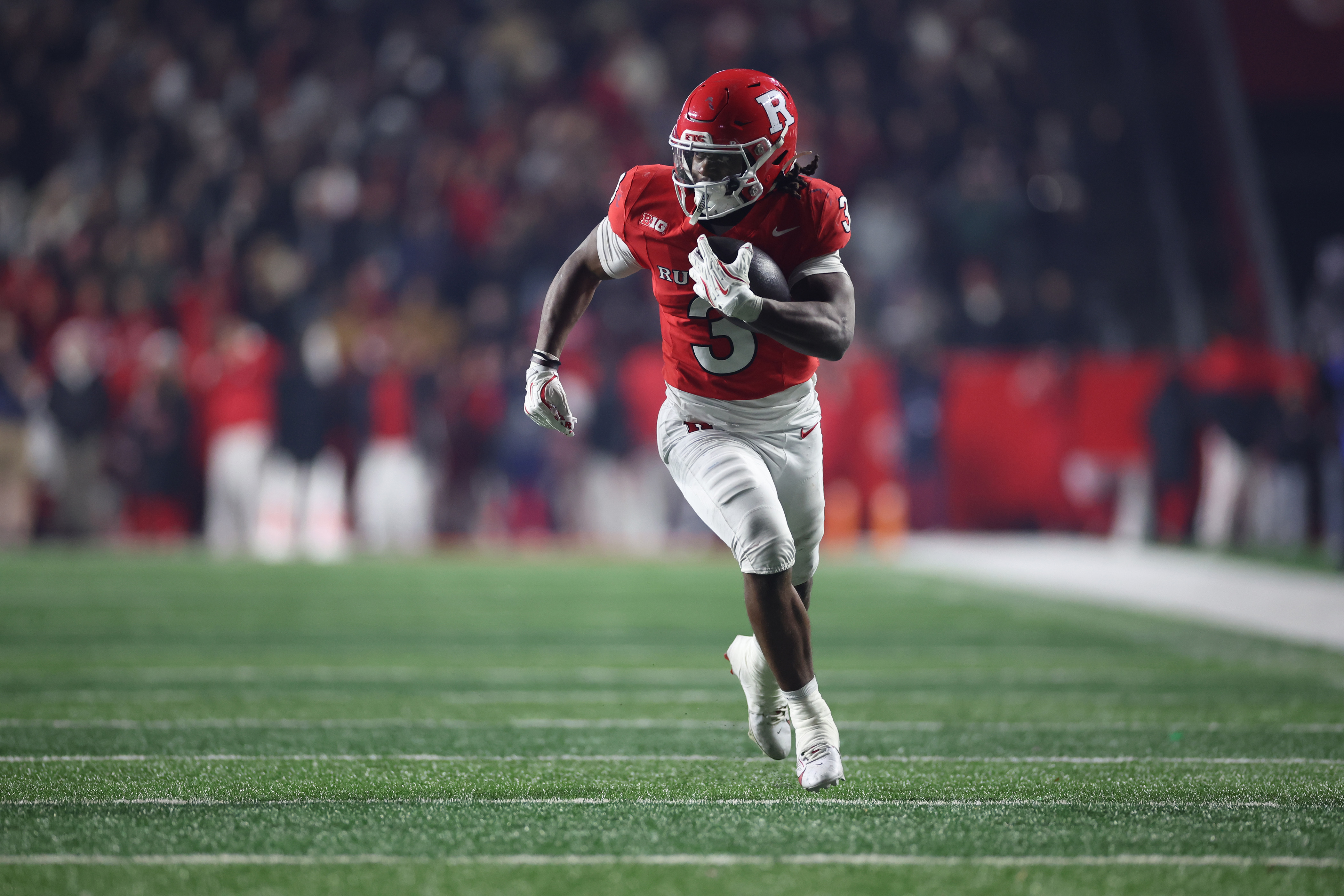 Rutgers running back Antwan Raymond carries the ball for a run. Raymond was third in the Big Ten last year in total rushing yards with 1,241. (Courtesy of Rutgers University Athletics)