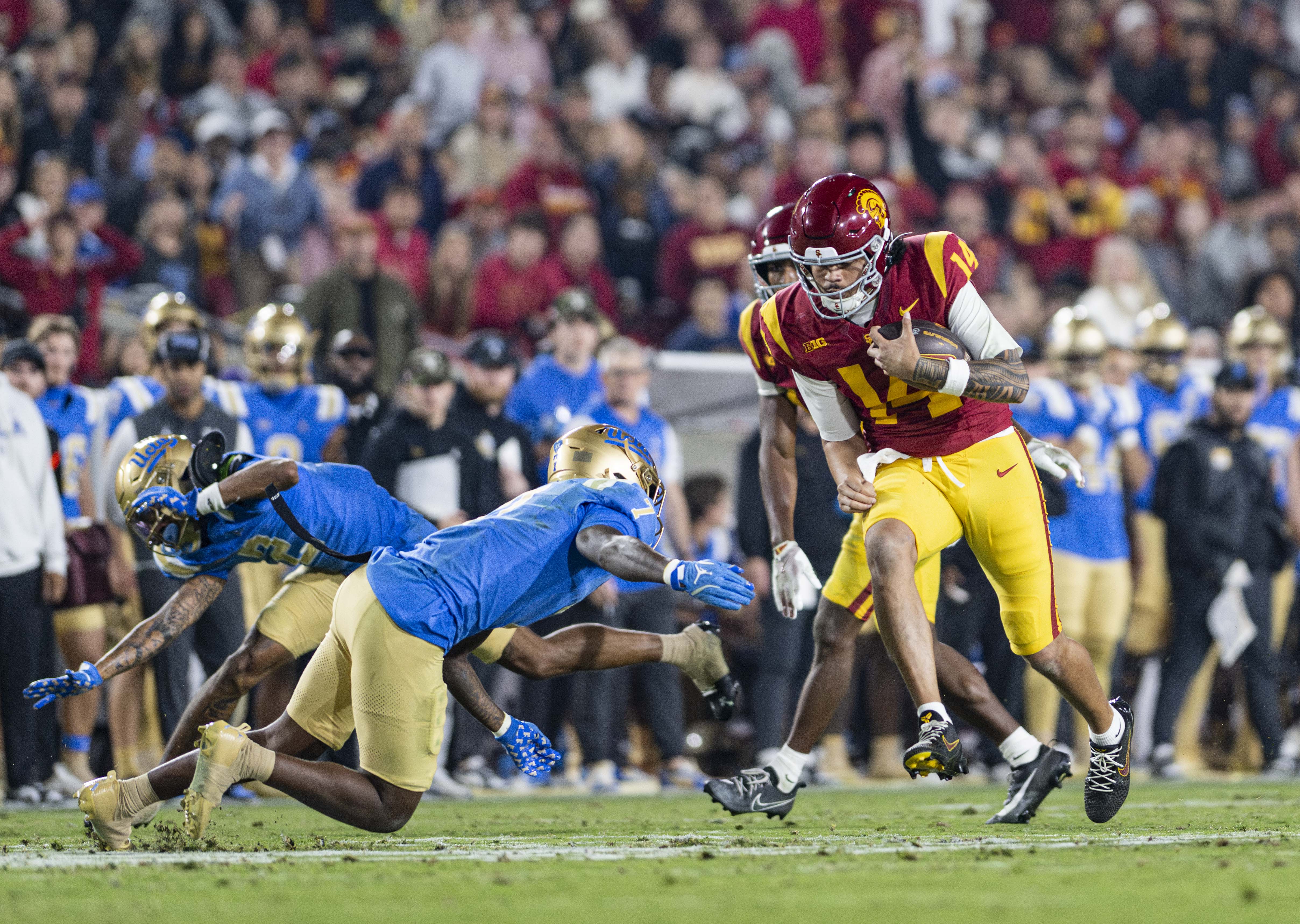 USC quarterback Jayden Maiava runs with the football. Maiava led the Big Ten in passing yards last year with 3,711. (Daily Bruin file photo)