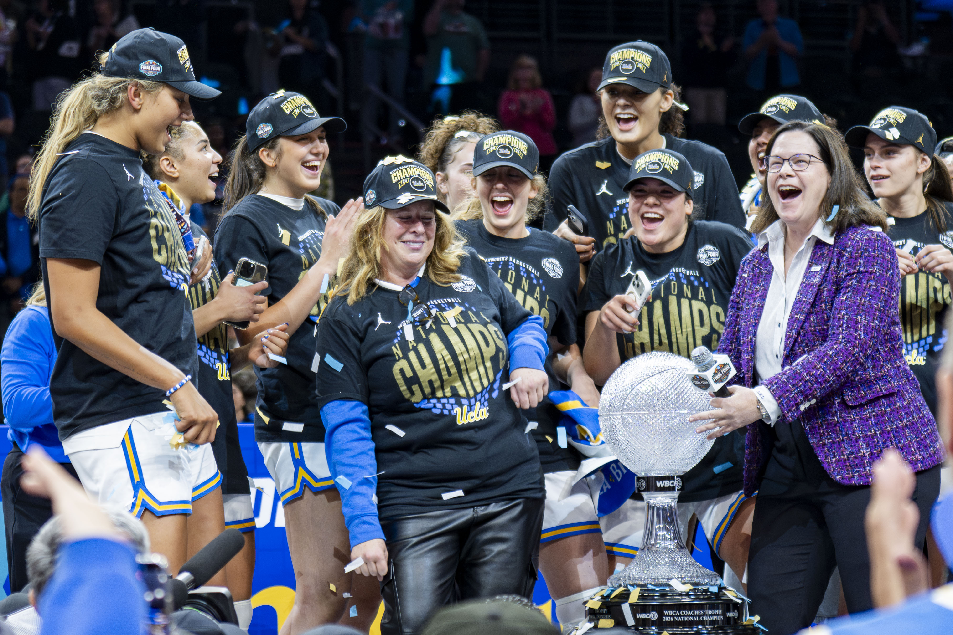 Coach Cori Close and her team celebrate the national championship victory. The team defeated South Carolina 79-51 to win its first national championship in the March Madness era. (Daily Bruin file photo)
