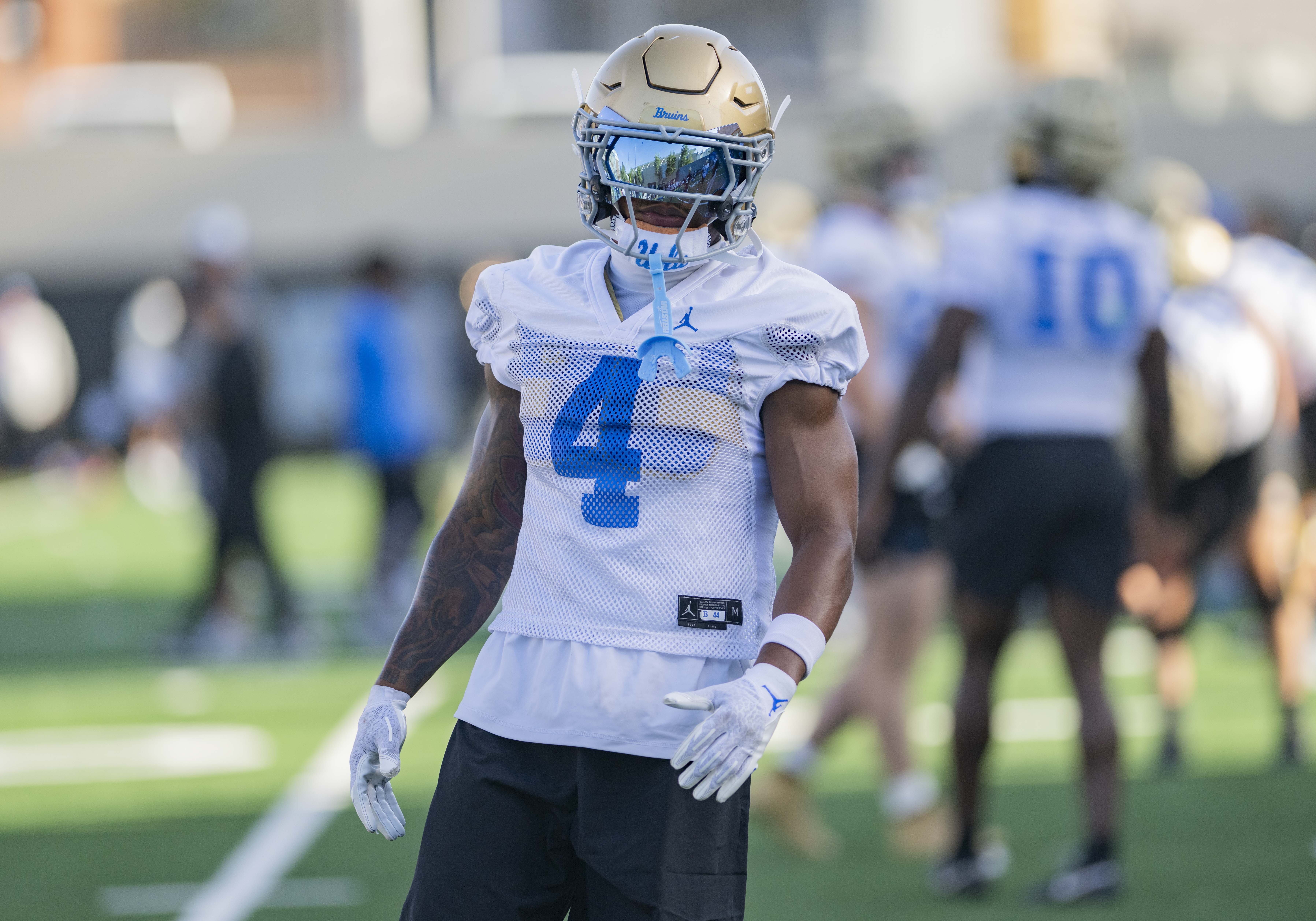 Rising redshirt junior defensive back Cole Martin stands on the field. Martin is returning to UCLA for his second season with the squad after initially entering the transfer portal. (Leydi Cris Cobo Cordon/Daily Bruin senior staff)