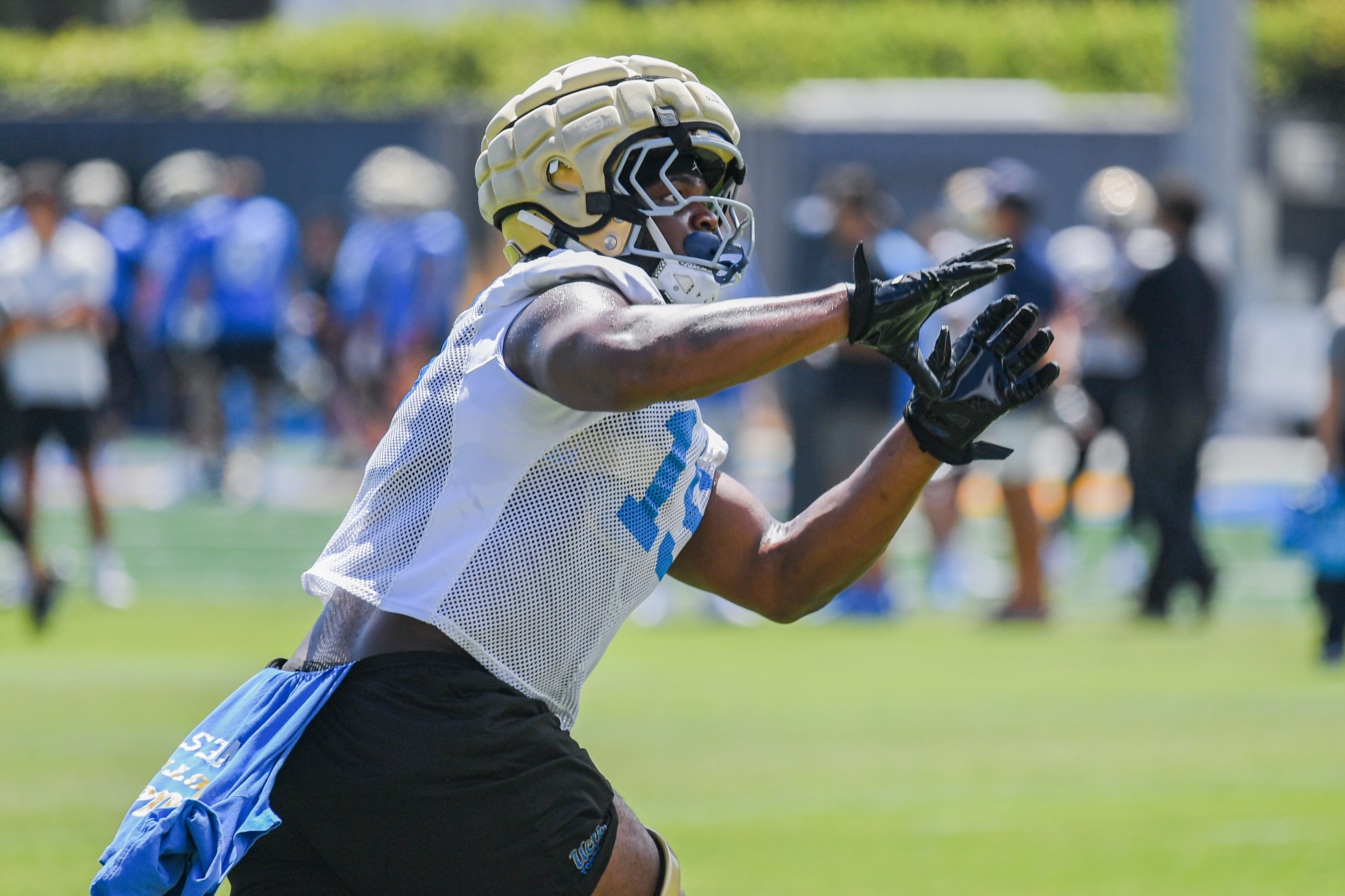 West prepares to catch a ball during UCLA’s practice at Spaulding Field. (Kai Dizon/Assistant Photo editor)