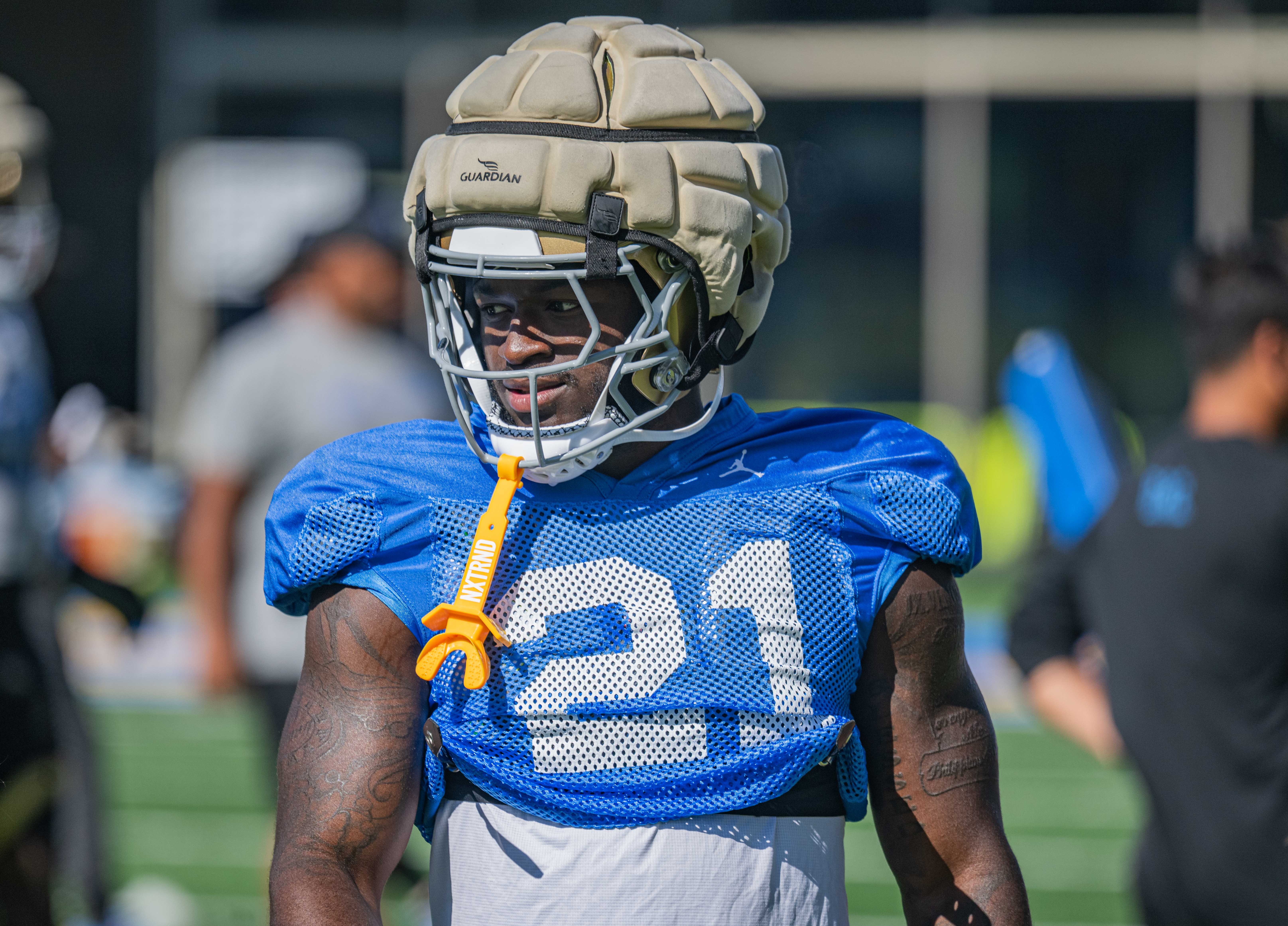 UCLA football senior runningback Jaivian Thomas practices at Spaulding Field on Aug. 17. (Kai Dizon/Assistant Photo editor)