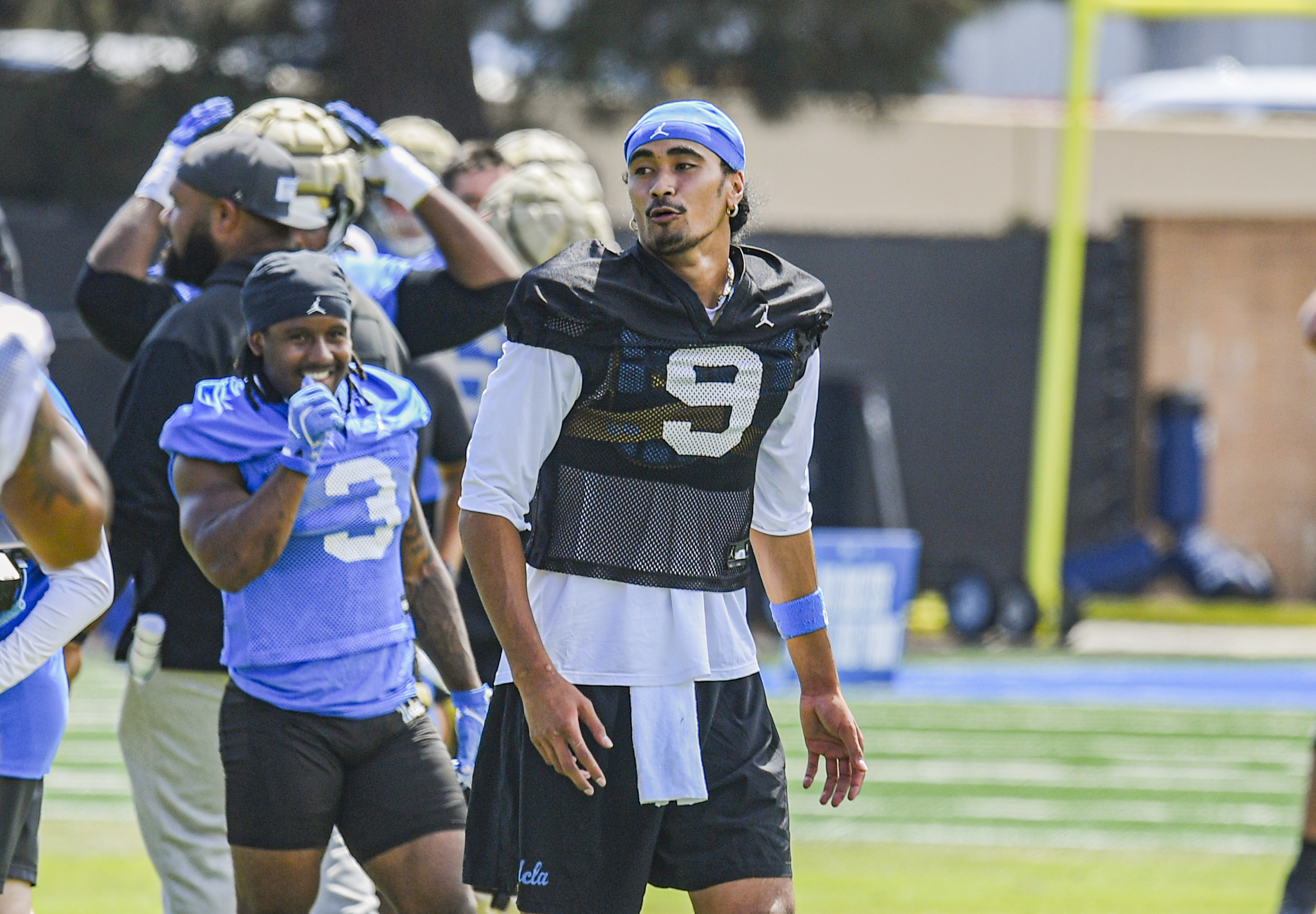 Iamaleava stands on the field during practice. Iamaleava threw for 1,928 yards and 13 touchdowns last season. (Kai Dizon/Assistant Photo editor)