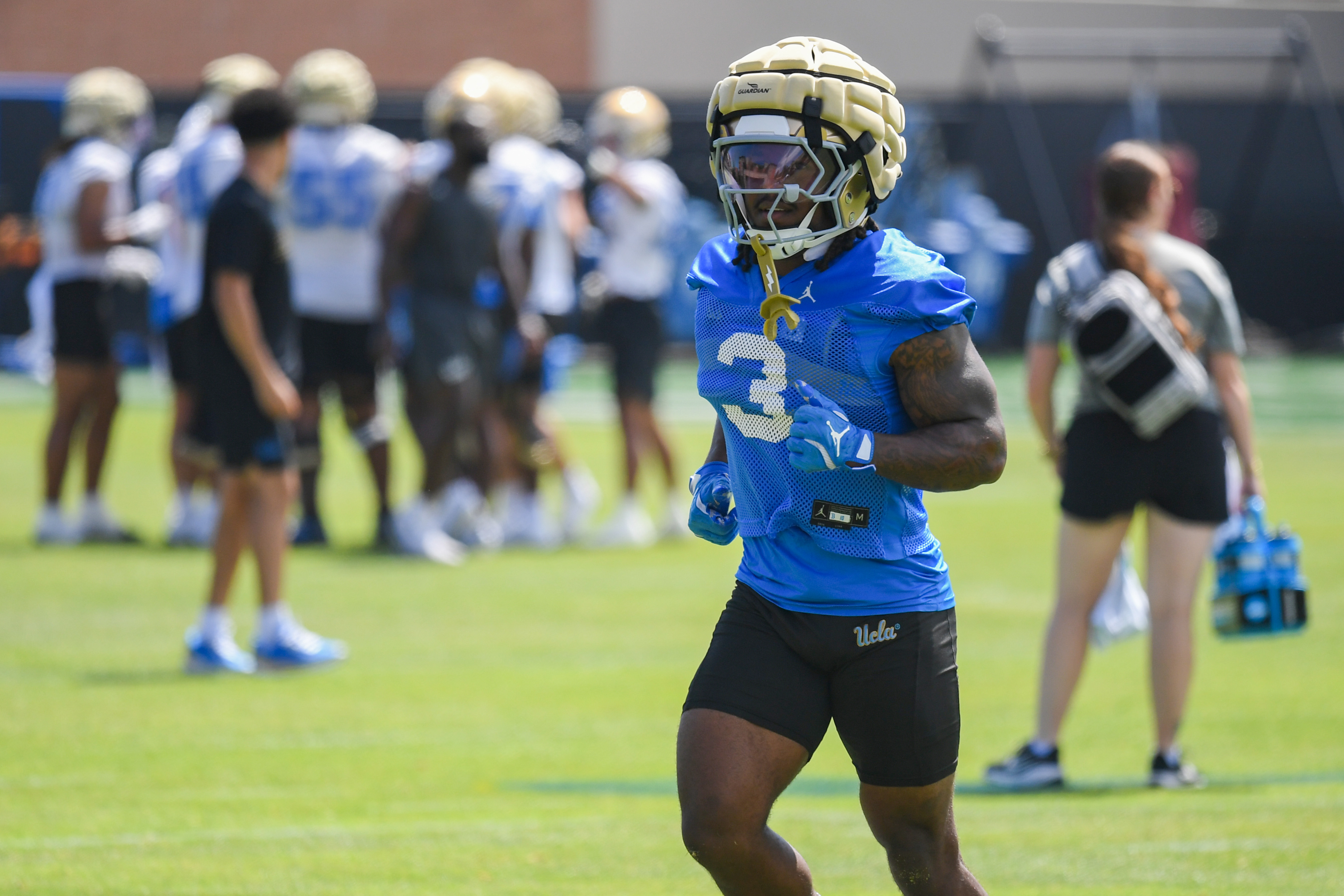 Fifth-year running back Wayne Knight jogs during practice. Knight spent the last four seasons at James Madison.