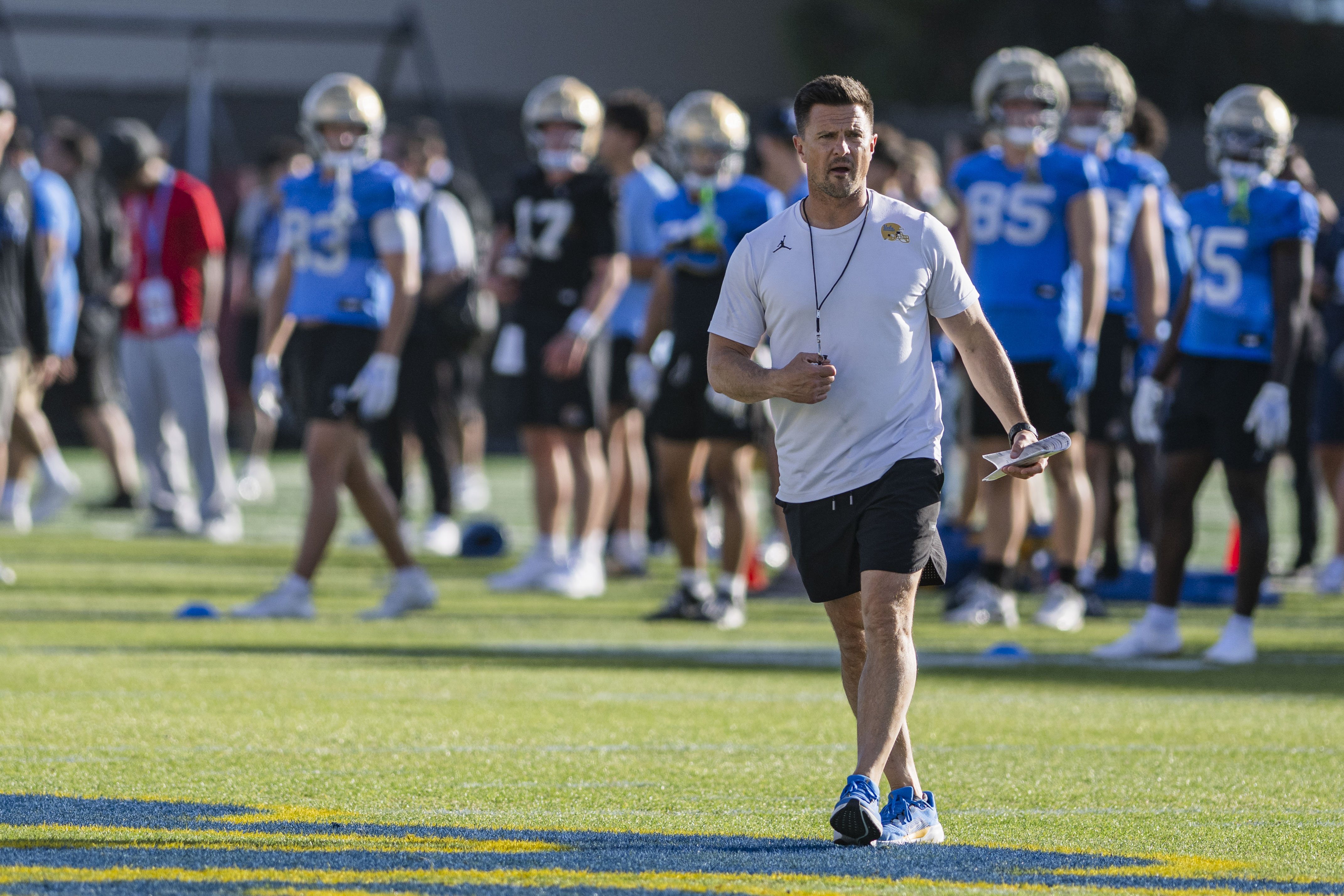 Chesney watches his team practice April 24. Chesney will debut as UCLA's head honcho on Sept. 5. (Leydi Cris Cobo Cordon/Daily Bruin senior staff)