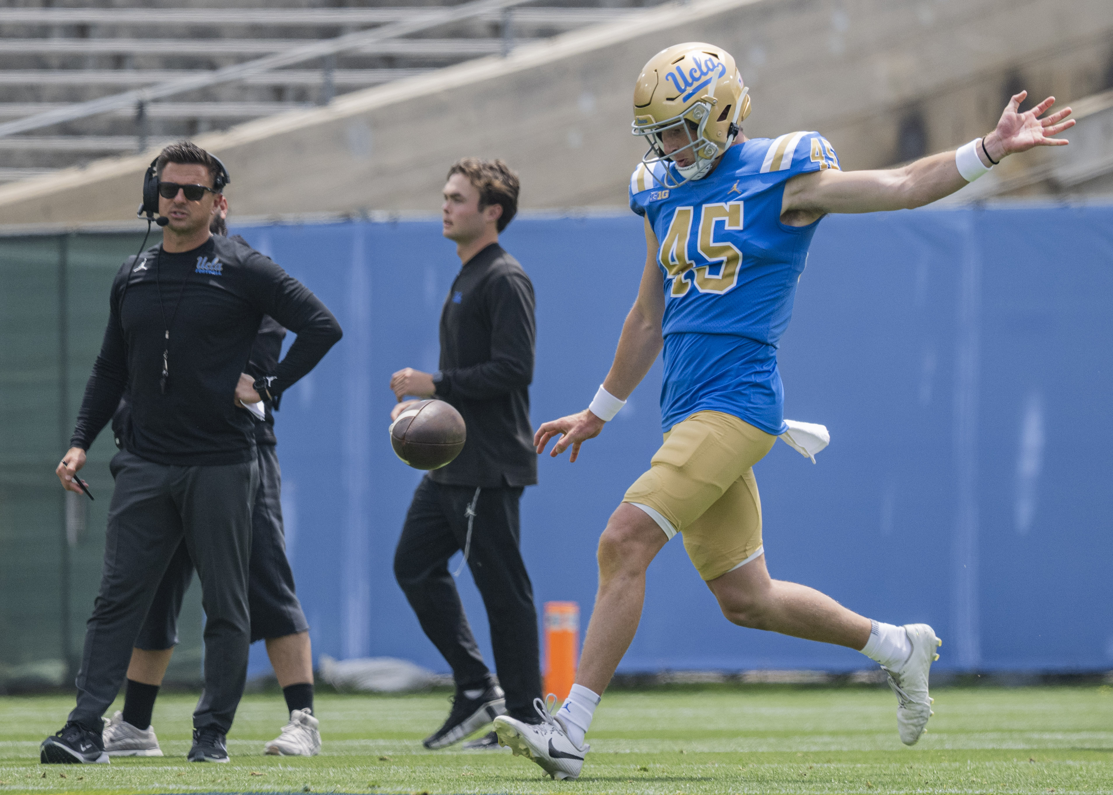 Fifth-year punter Chase Barry attempts a punt during UCLA's spring game May 2 at the Rose Bowl. (Kai Dizon/Assistant Photo editor)