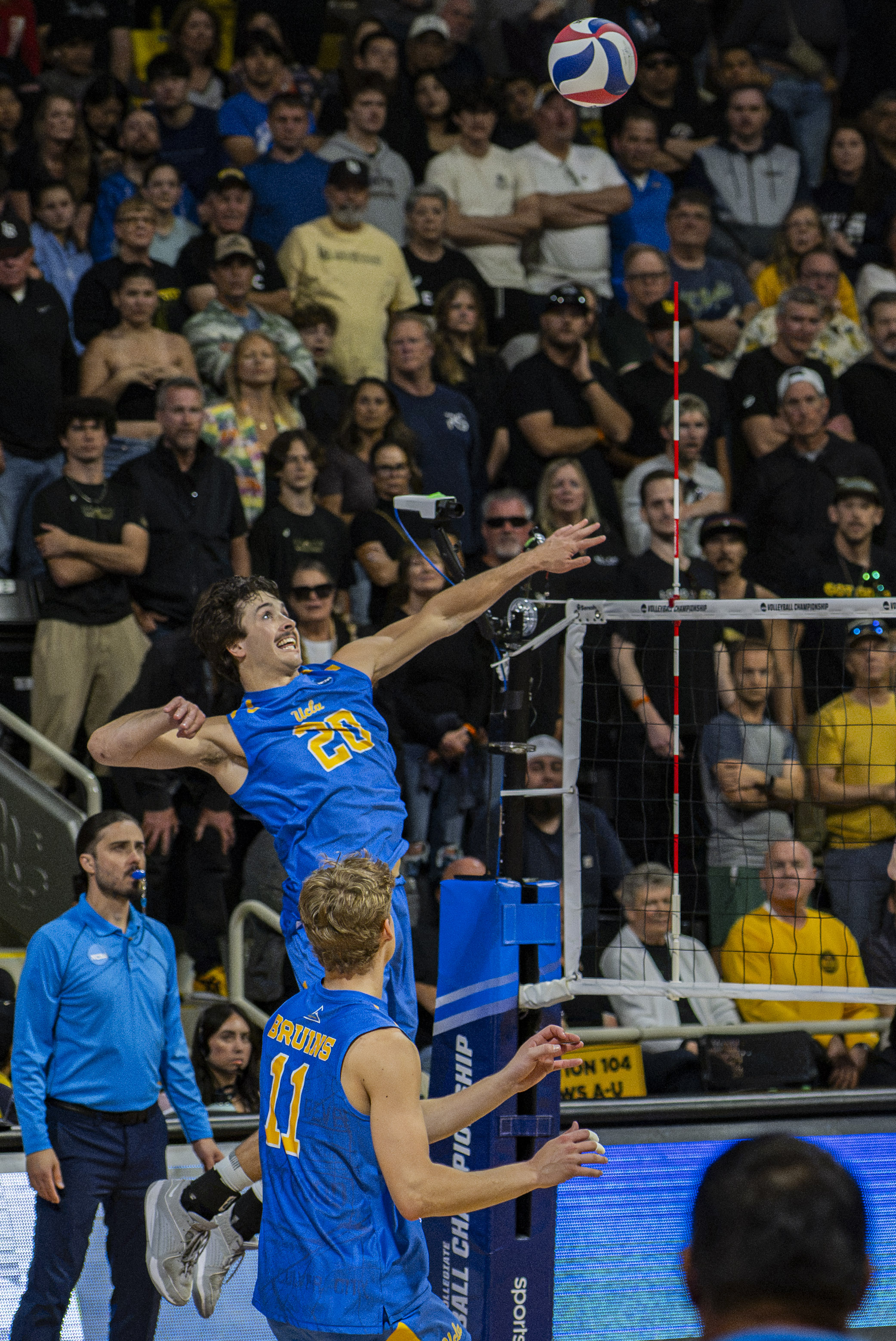 Former Bruin outside hitter Ethan Champlin prepares to hit the ball. Champlin recorded 21 total kills across Team USA's three elimination matches. (Daily Bruin file photo)