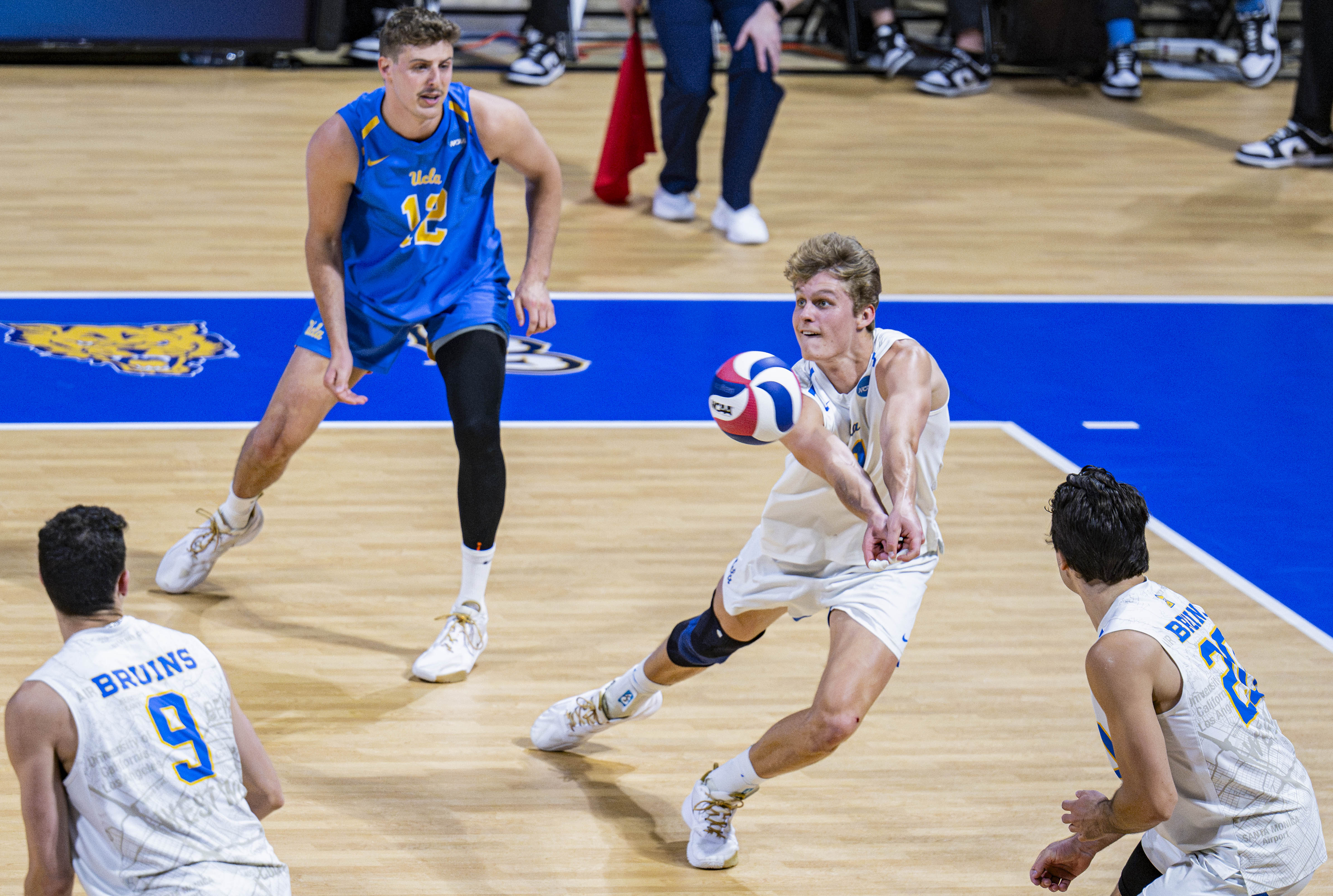 Former Bruin outside hitter Cooper Robinson extends his arms to receive the ball. Robinson recorded 11 total digs in the tournament. (Daily Bruin file photo)