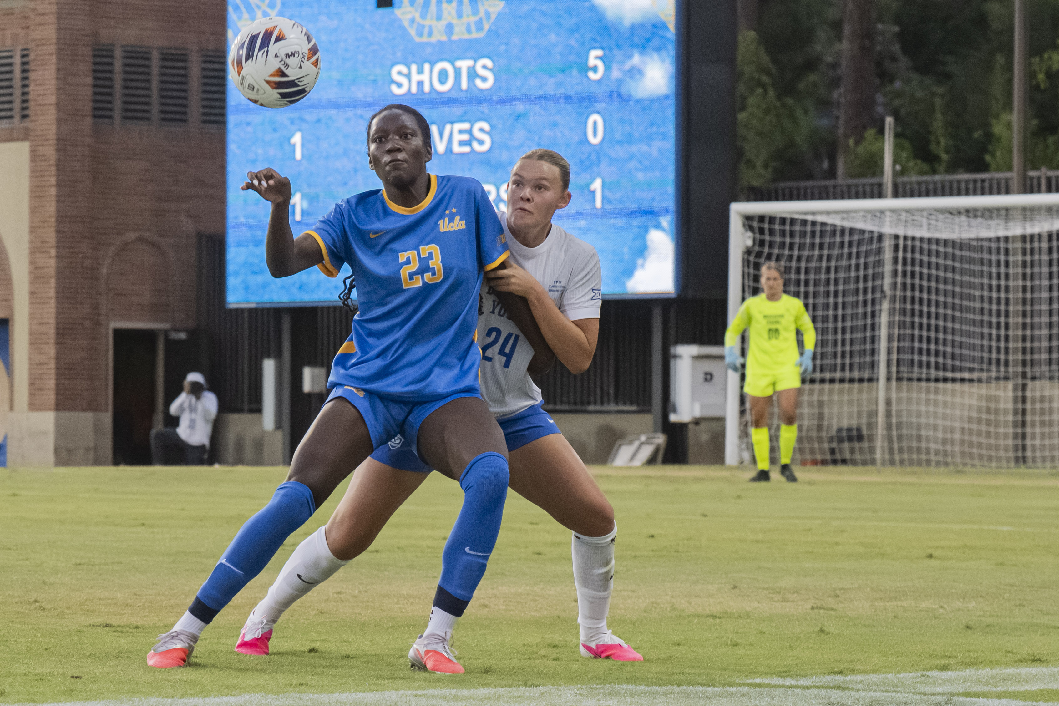 Junior forward Kara Croone tussles with BYU midfielder Bella Woods for possession. (Kai Dizon/Assistant Photo editor)