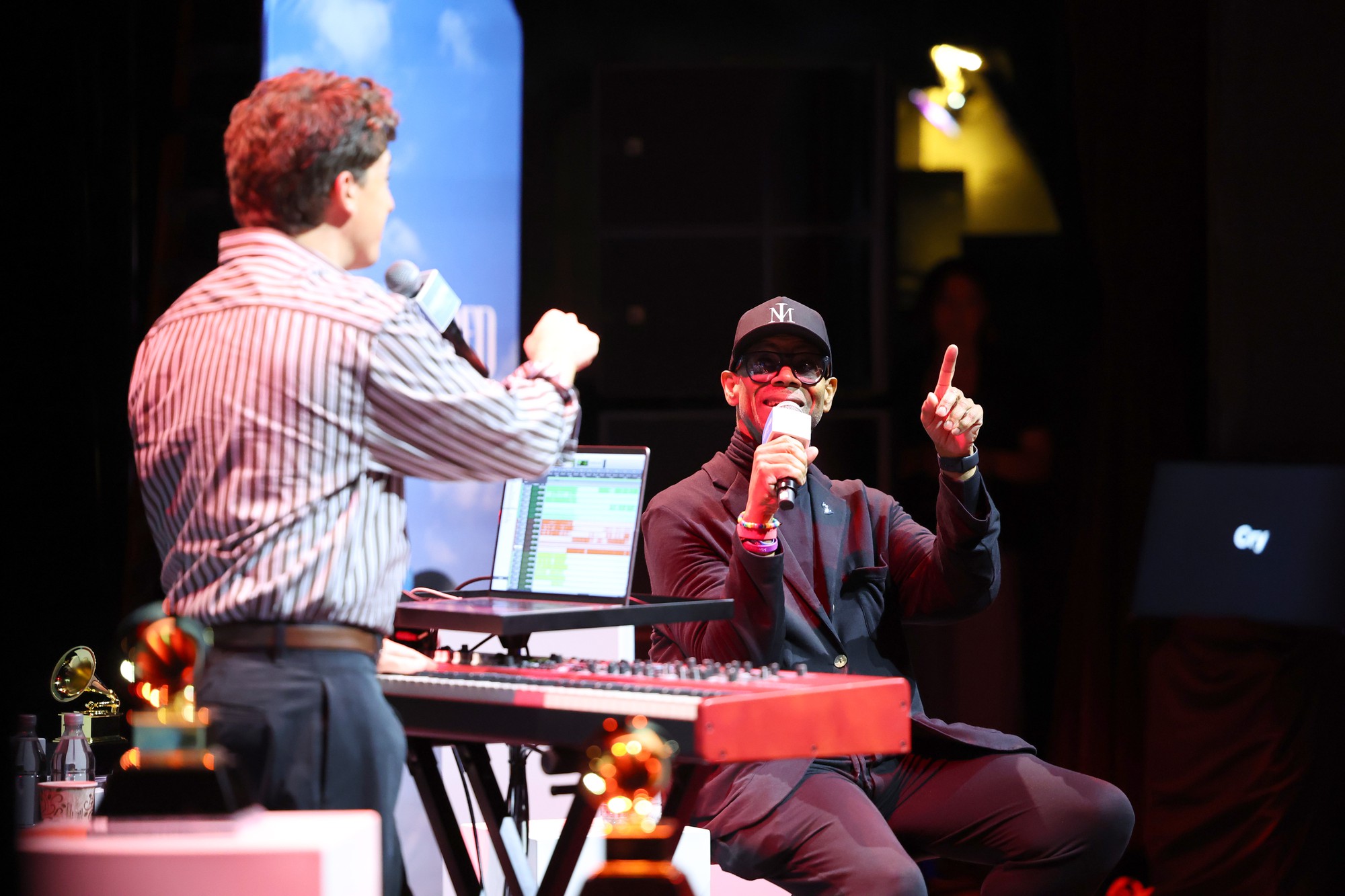 The workshop-style event where Puth and Jam combined a track-by-track song dissection with studio stories is pictured. Puth wears a striped button-down, while Jam is in a black suit jacket and a Yankees hat. (Courtesy of Araya Doheny/Getty Images for The Recording Academy)
