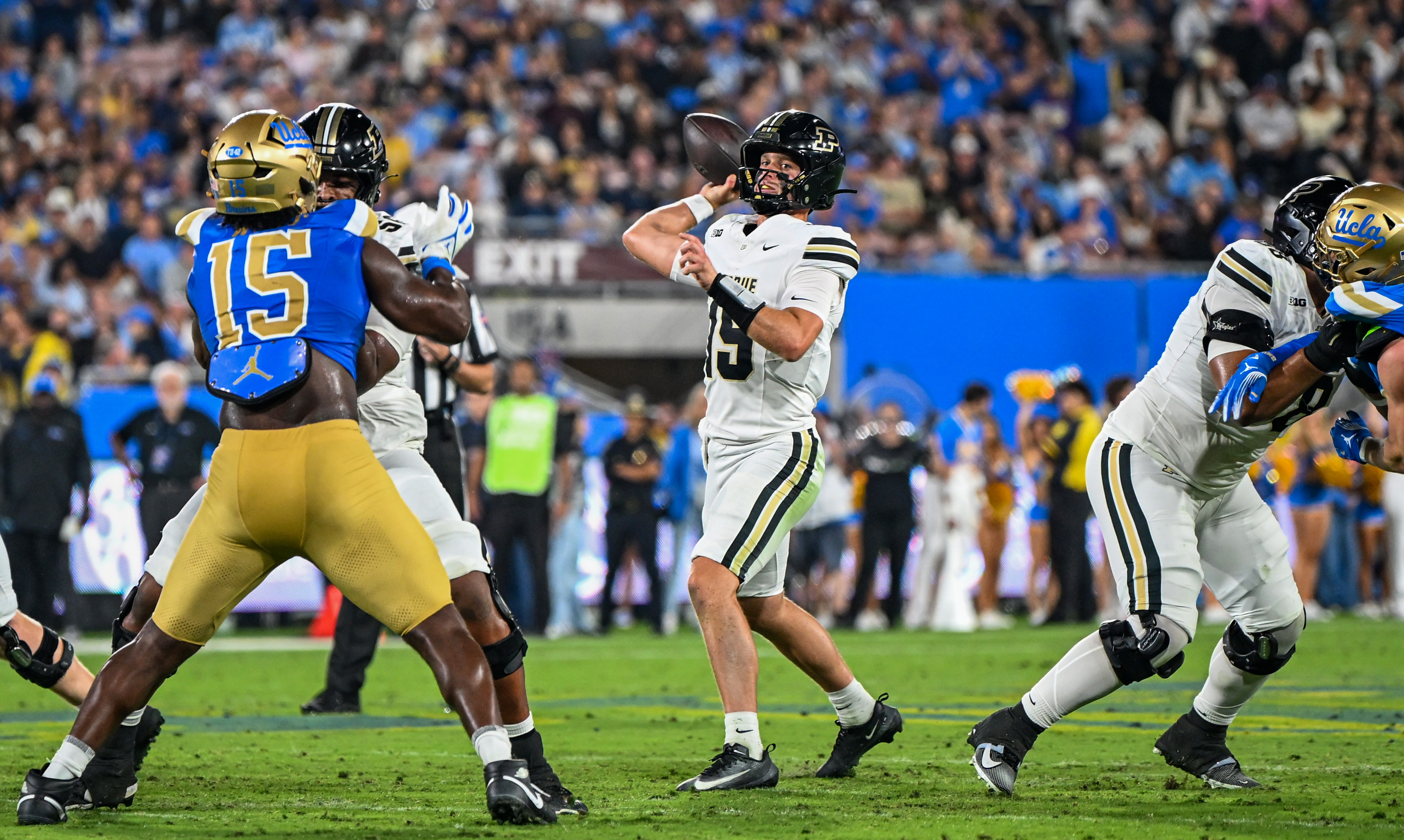 Purdue quarterback Ryan Browne attempts a pass with a clean pocket. (Kai Dizon/Assistant Photo editor)