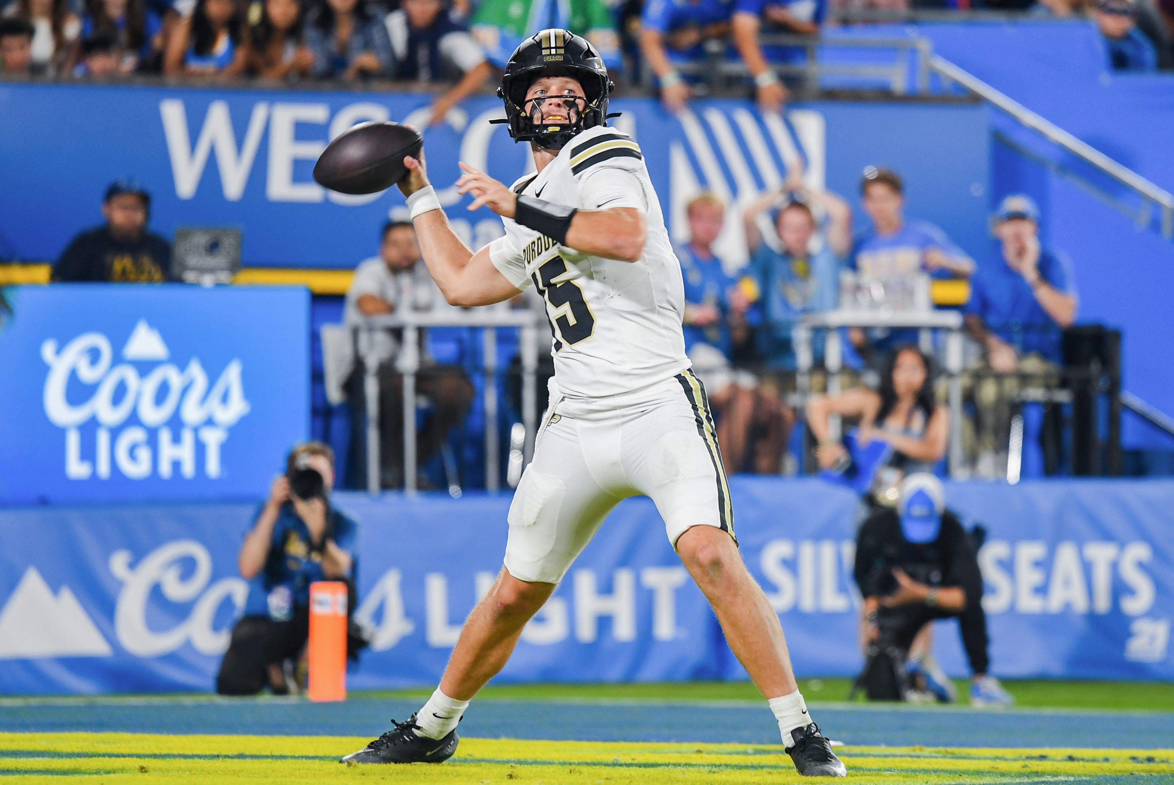 Purdue quarterback Ryan Browne reaches back to pass Saturday against UCLA. (Kai Dizon/Assistant Photo editor)