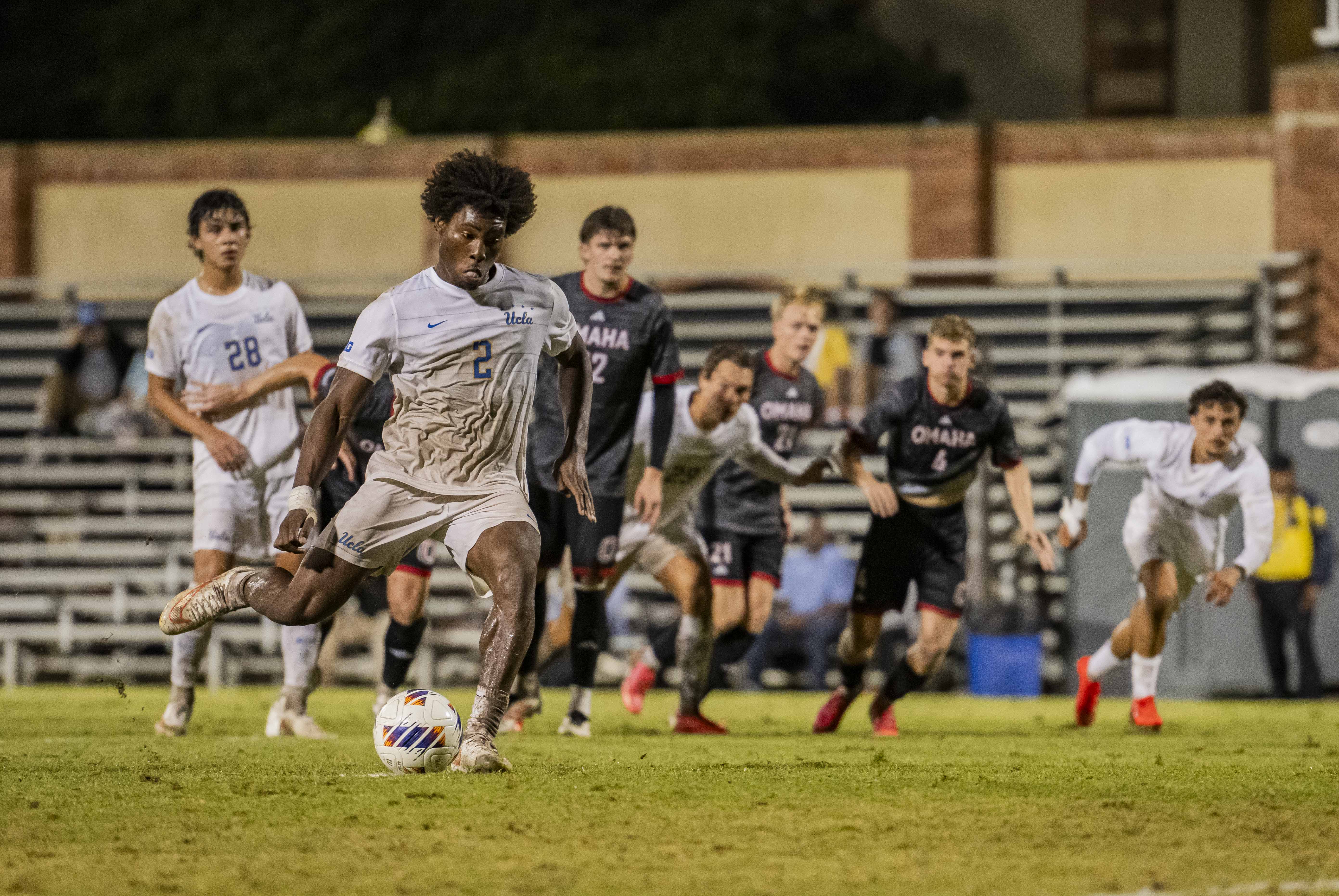 Junior defender Shakir Nixon takes a penalty kick in UCLA's 2-1 victory over Omaha. He leads the squad in goals, racking up three through the season. (Elle Smith/Daily Bruin staff)