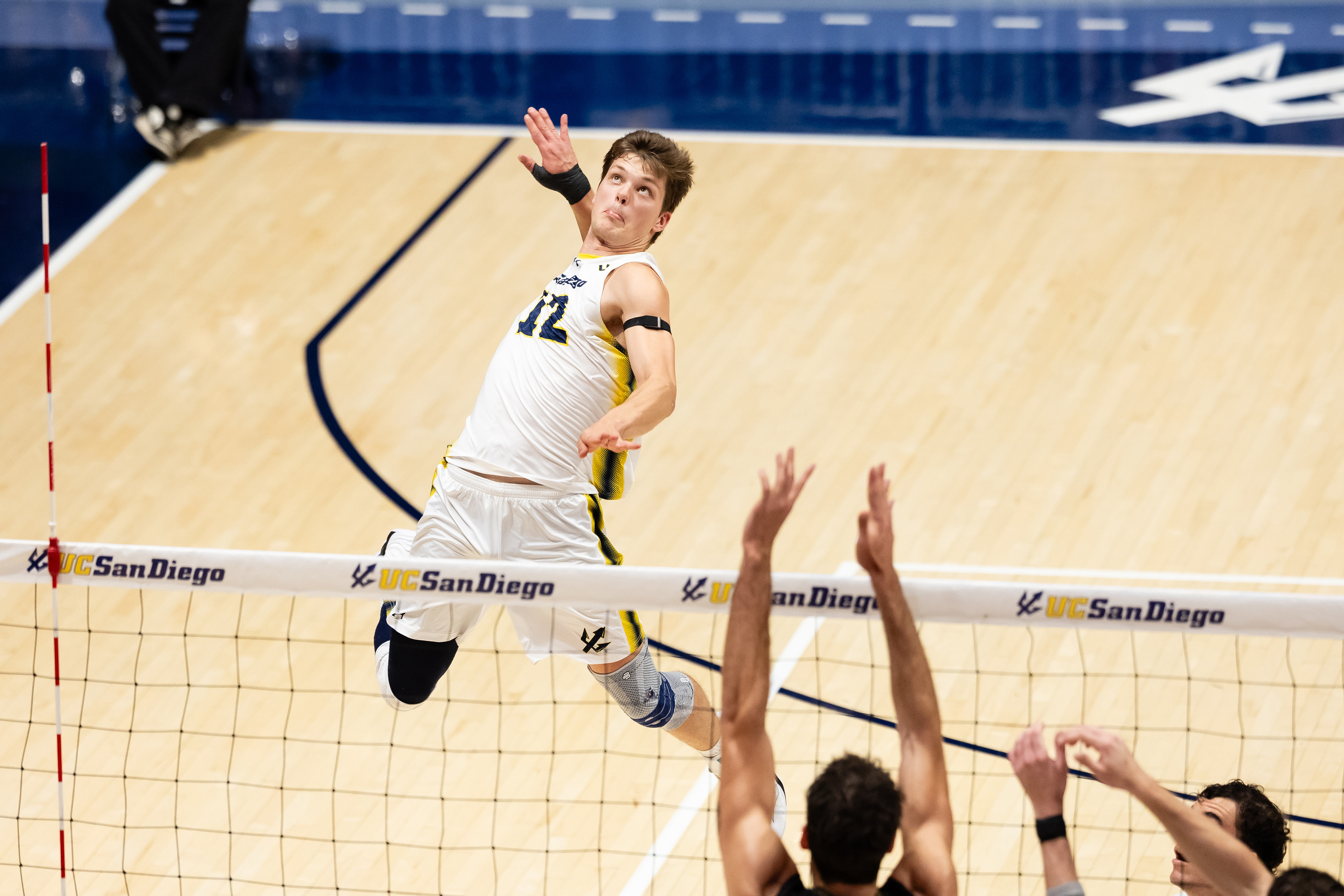 Senior outside hitter Josh Ewert rises and focuses on the ball before a kill. Ewert was named an All-Big West Honorable Mention last season with the Tritons. (Courtesy of UC San Diego Athletics)