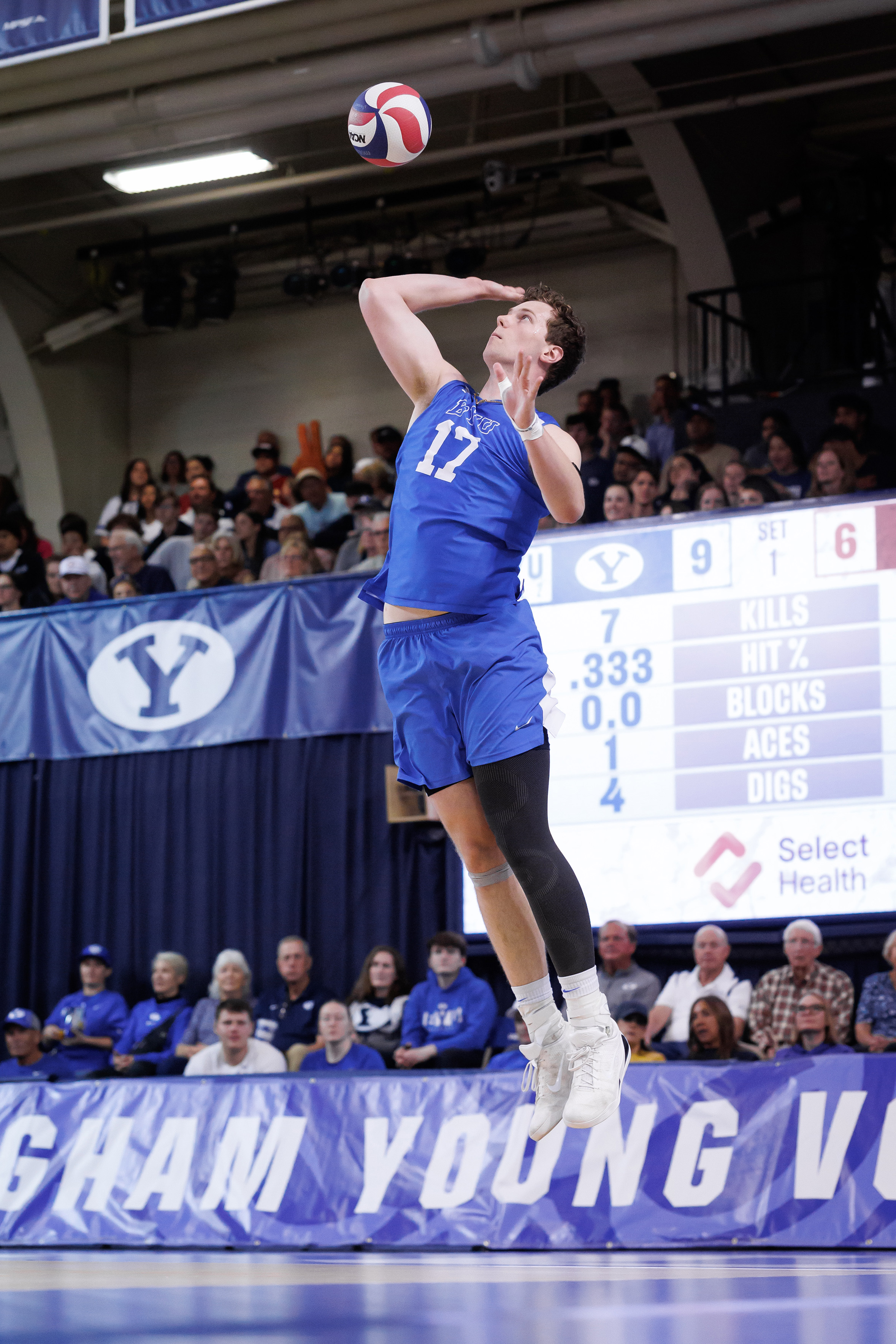 Junior middle blocker Gavin Chambers jumps for a serve. Chambers increased his kills-per-set clip from .824 to .982 across his two seasons with the Cougars. (Courtesy of BYU Athletics)