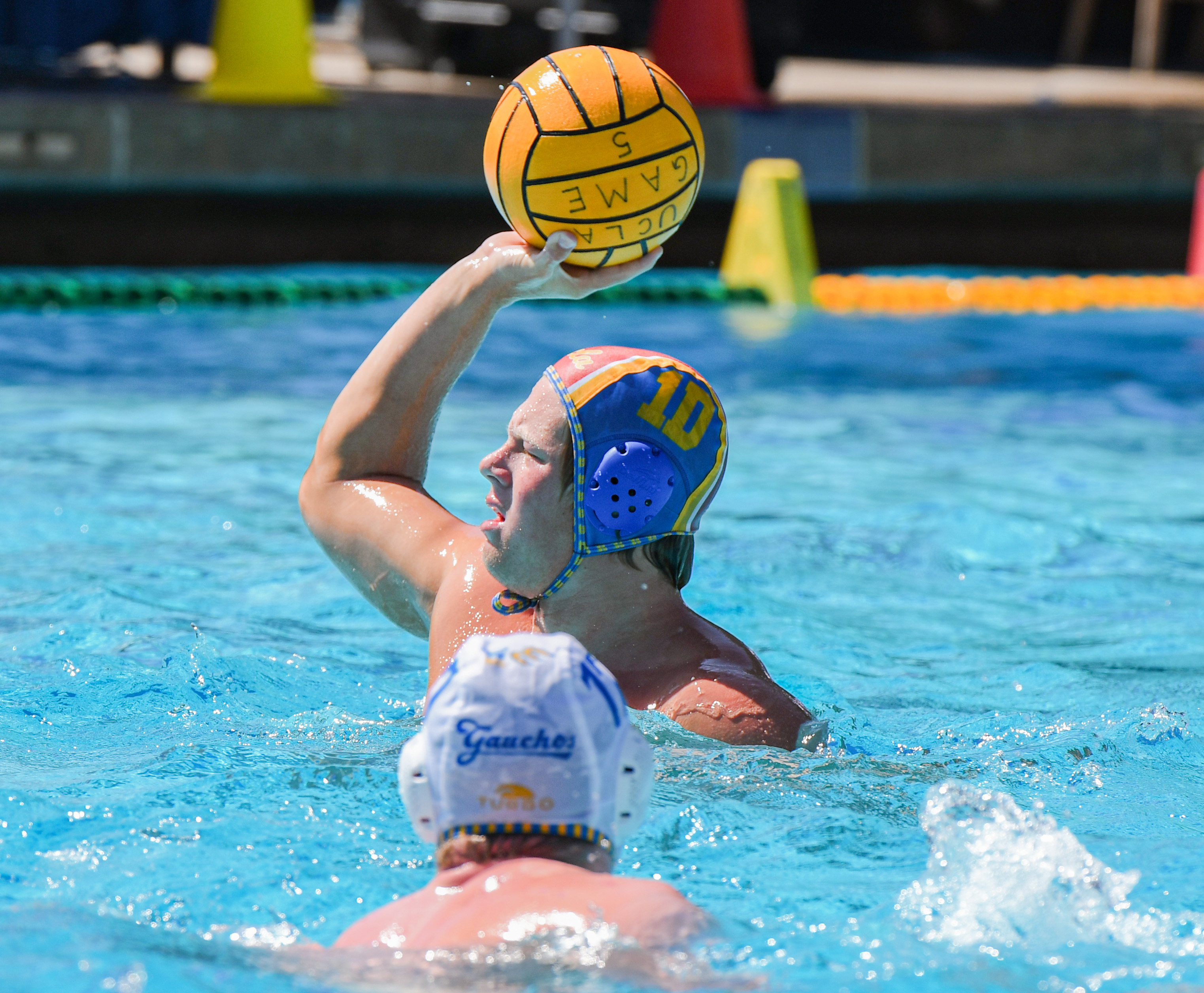 Junior attacker Ryder Dodd raises the ball before a pass. Dodd is the Bruins' leading scorer with 25 goals across the season so far. (Elle Smith/Daily Bruin staff)
