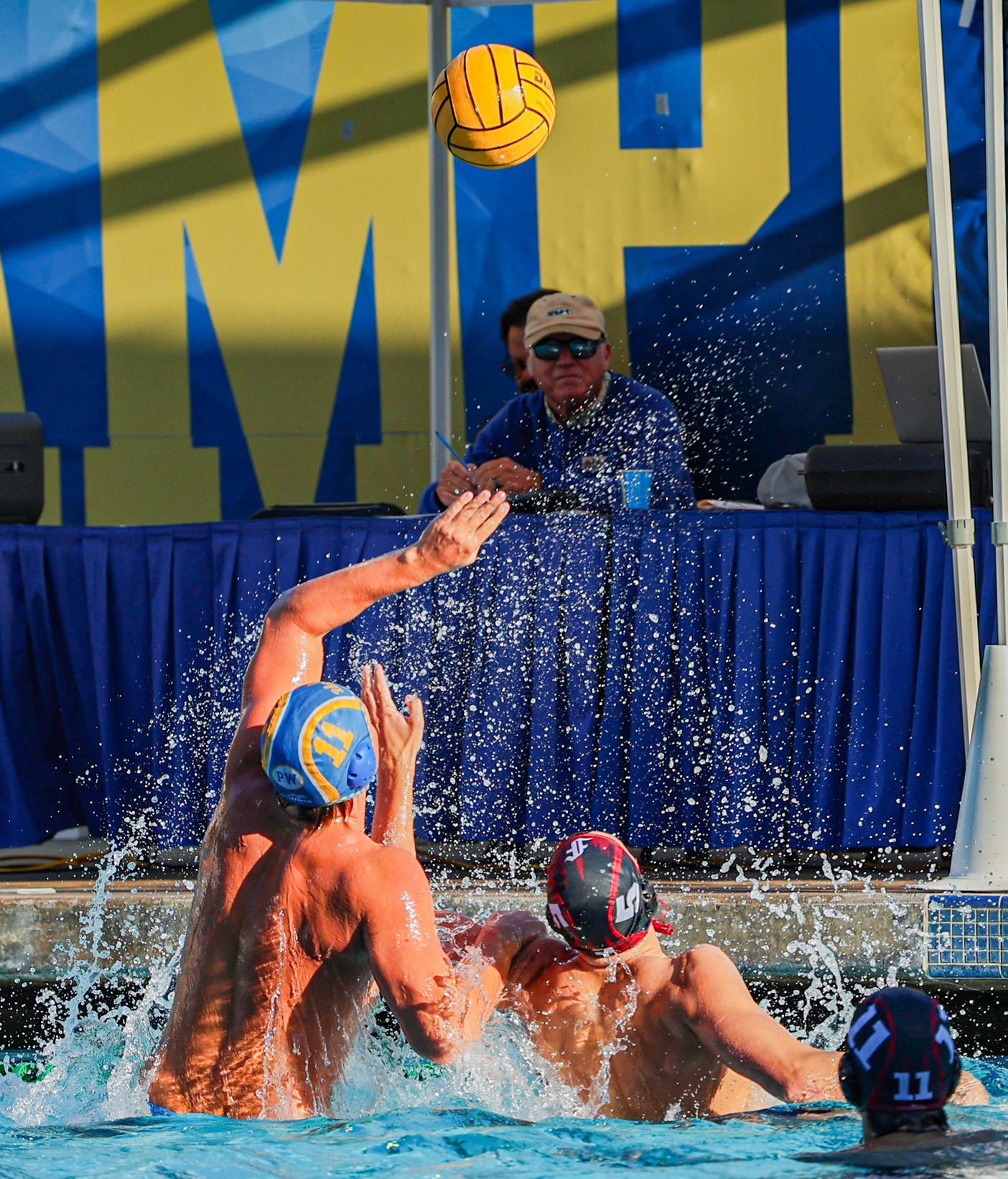Dodd competes with a Fordham player to secure the ball.