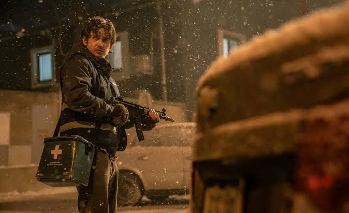Austin Abrams, as Bryan Hodukavich, stares off into the snow. Director Zach Cregger helped adapt the long-running Resident Evil video game franchise into a fresh, standalone horror classic. (Courtesy of IMDb)