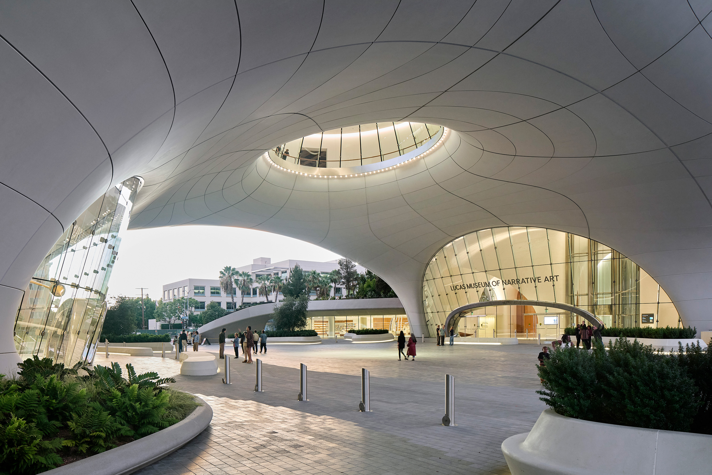 The underside of the museum is shown, with sleek curves and modern edges that make the museum feel reminiscent of a spaceship. Founded by “Star Wars” filmmaker George Lucas and his wife, businesswoman Mellody Hobson, the Lucas Museum showcases diverse styles of visual storytelling, such as painting and comic art. (Courtesy of Hufton Crow)