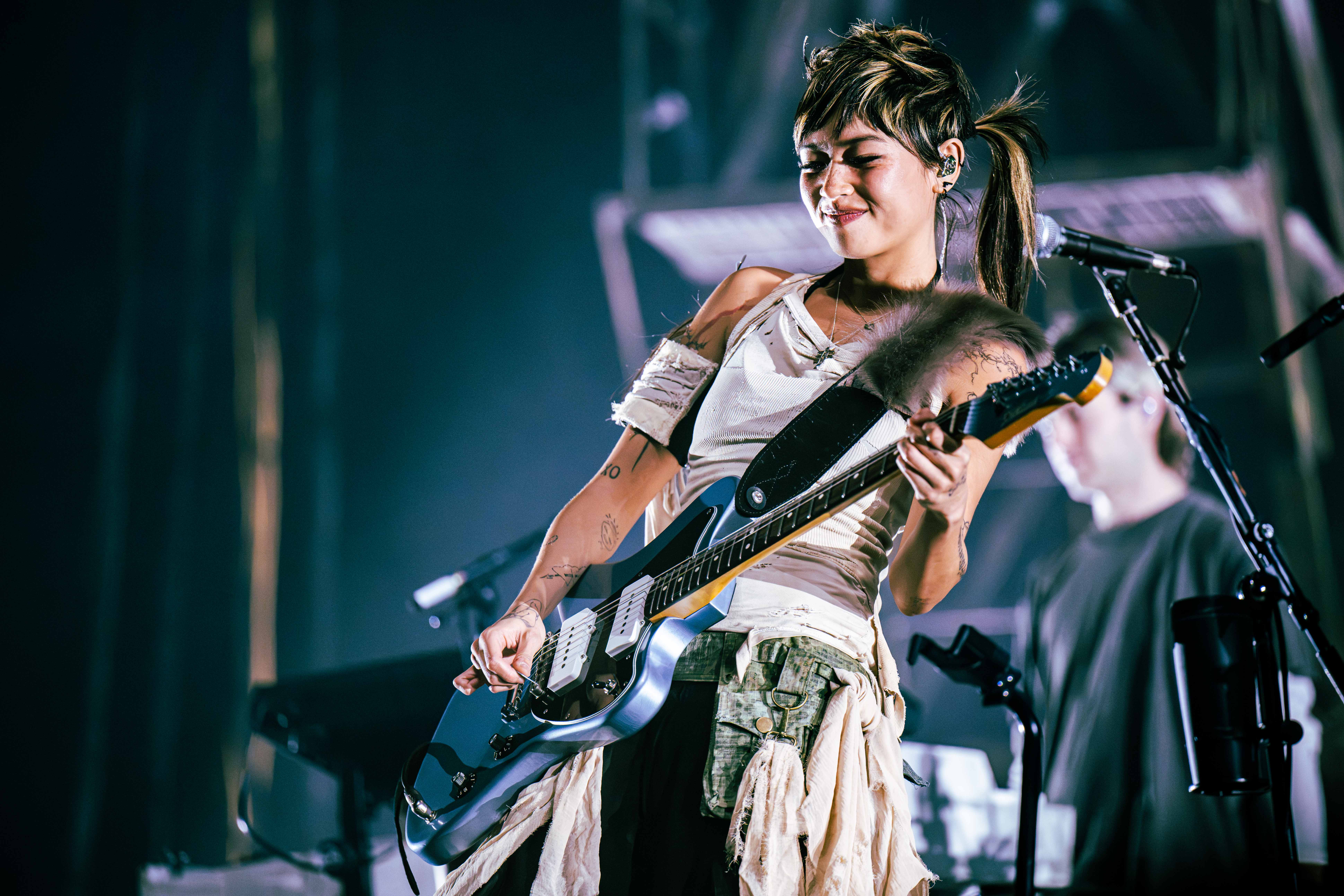 Beabadoobee took to the stage at 9 p.m. and opened with “Sun Has Set,” a high-energy classic rock song from her new album. With the sounds of crackling powerlines in the background, a pylon appeared through the fog. (Andrew Ramiro Diaz/Photo editor)