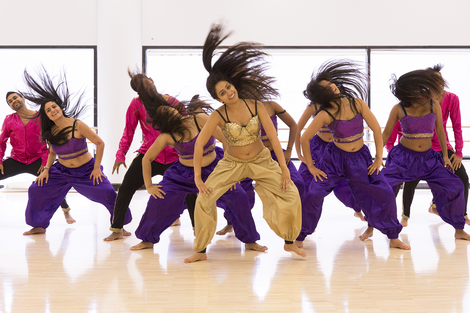 UCLA Nashaa, the school’s Bollywood dance team that inspired “Best of the Best,” is pictured in various colorful costumes. Pranav Bhramasandra, a co-captain of UCLA Nashaa, said seeing a movie about his college dance team was very exciting. (Daily Bruin file photo)