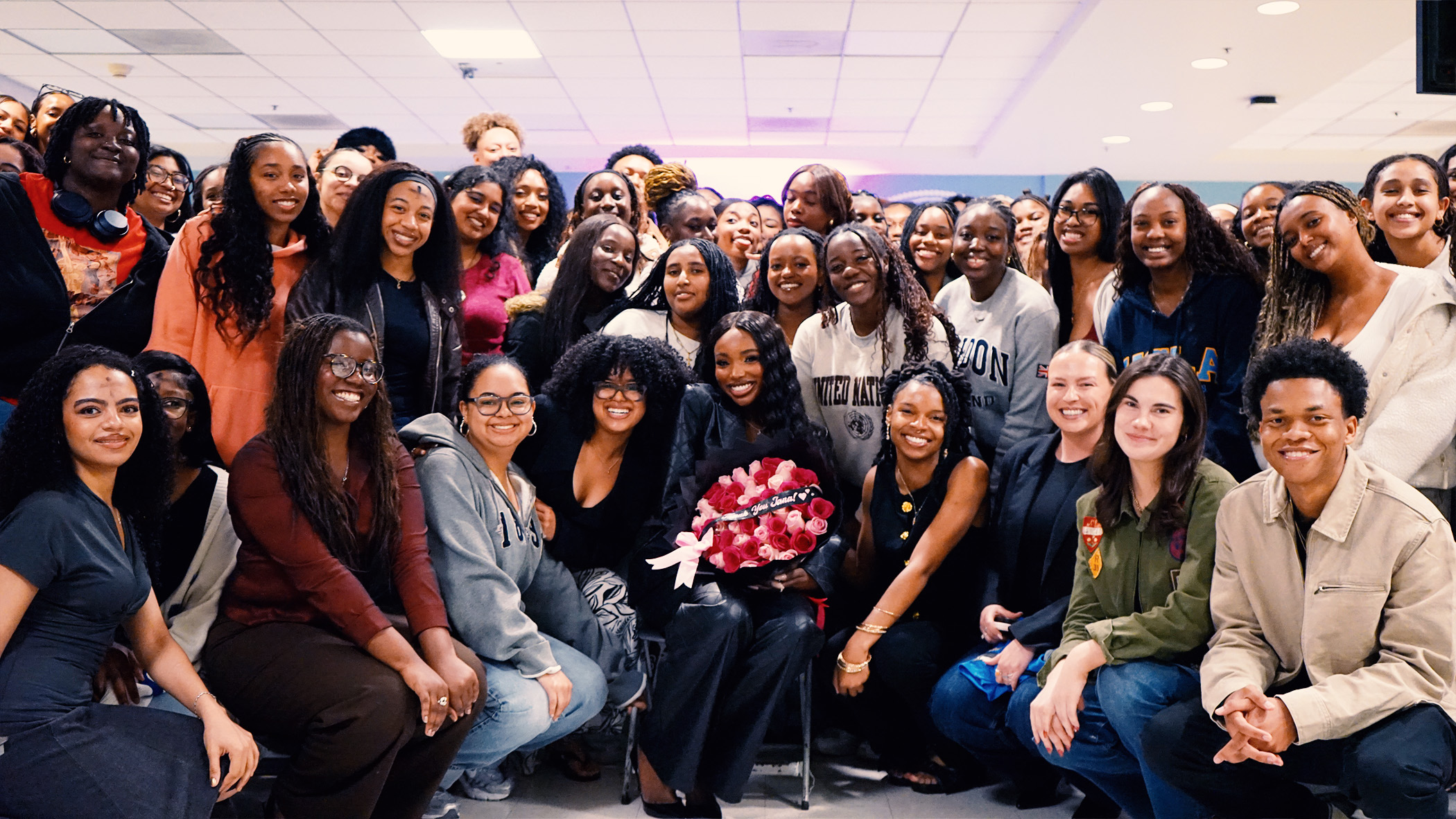 JaNa Craig of Love Island USA holds a bouquet after her presentation at Black365's inaugural event. The event took place Feb. 18, and Craig encouraged listeners to say yes to unexpected opportunities. (Courtesy of Runor Pinnock)