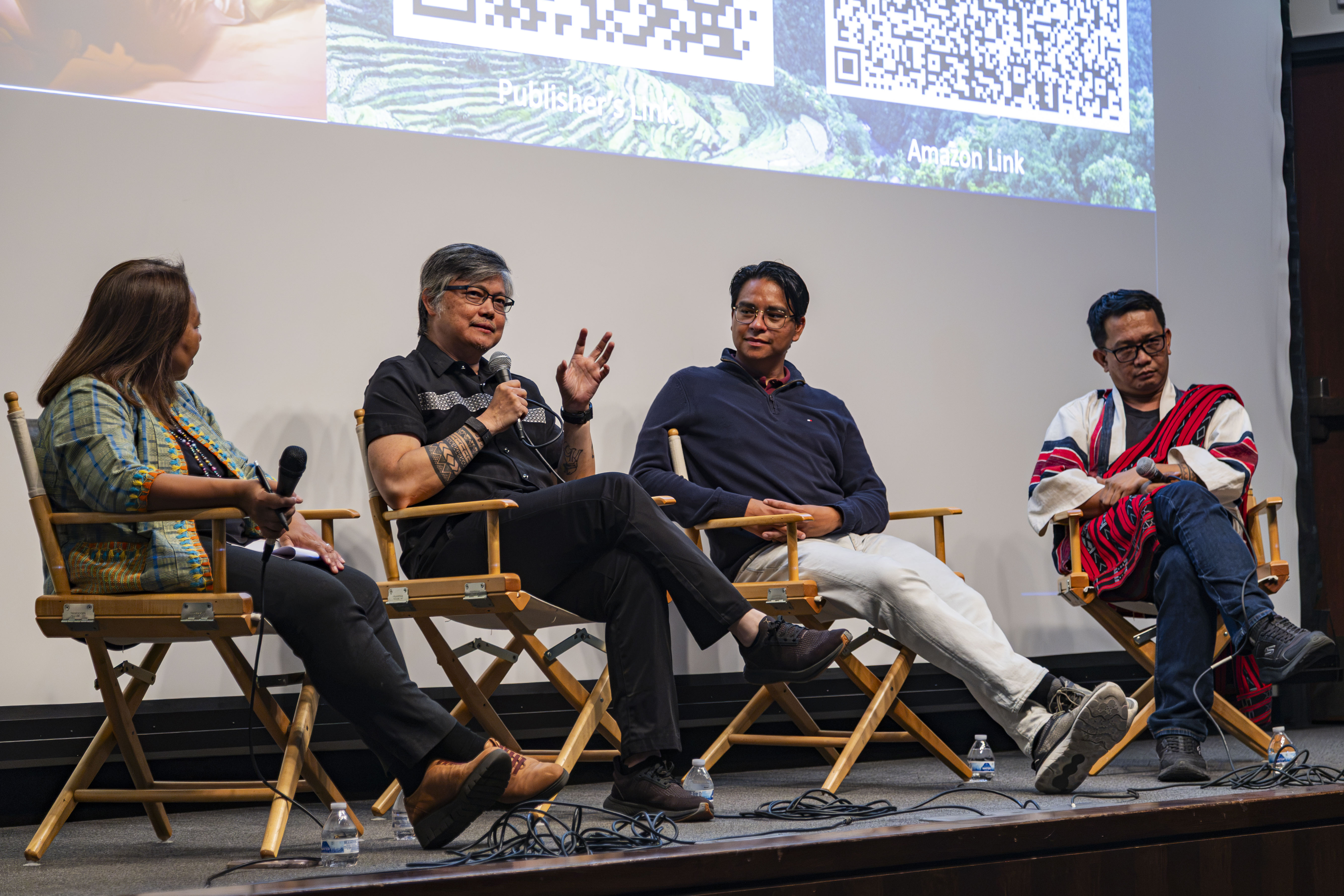 The event's panelists – Vina Lanzona, Stephen Acabado, Arnoud Arps and Marlon Martin – sit on stage. The panel was held in conjunction with the museum’s “Mountain Spirits: Rice and Indigeneity in the Northern Luzon Highlands, Philippines” exhibition, which opened April 12, and Acabado’s book “Stirring the Pot & the Past: Food Stories and Philippine History.” (Jiah Jung/Daily Bruin)