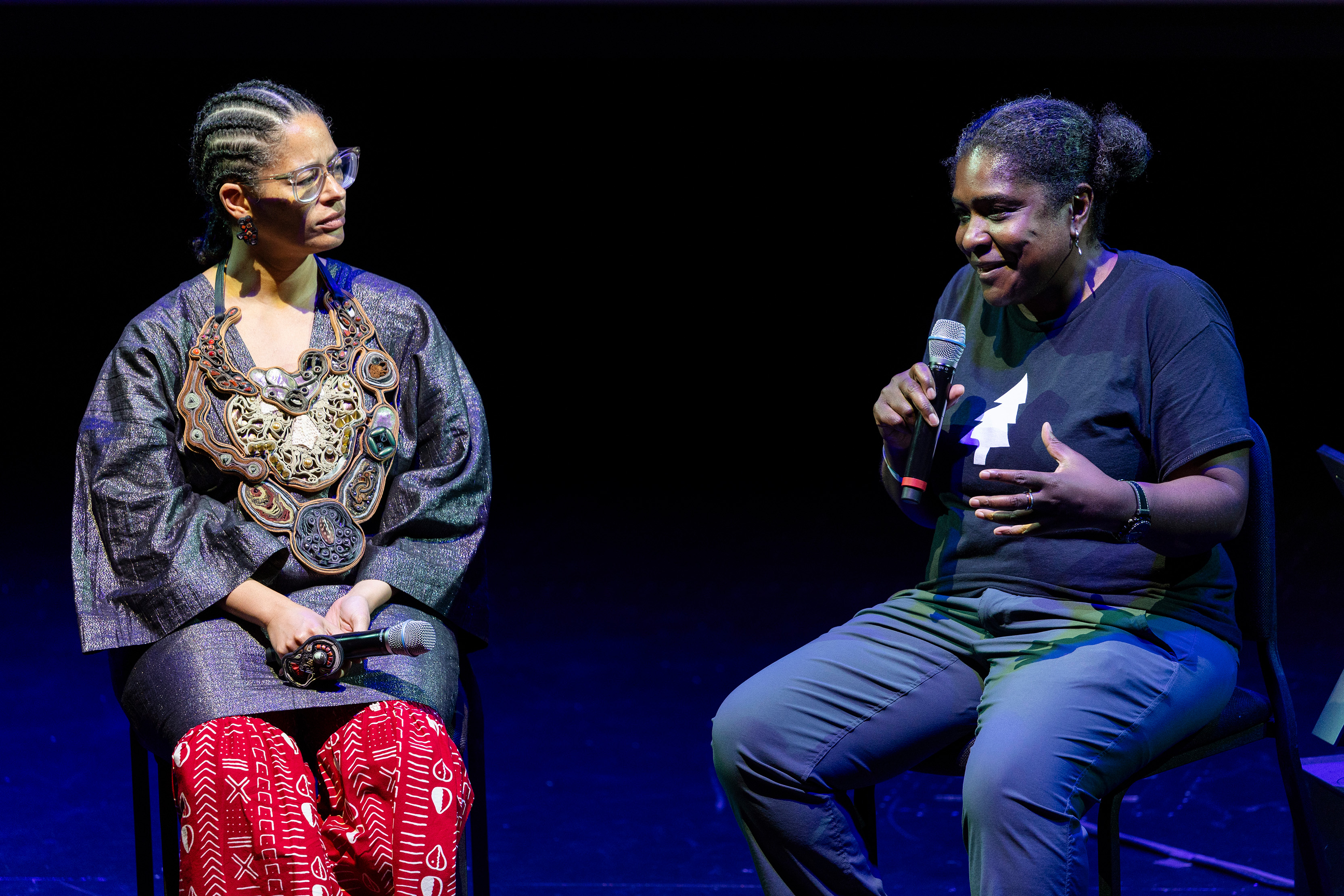 Jackson and assistant professor Tiffany E. Barber sit onstage in chairs for a conversation about Jackson’s creative process. The artist talked about her latest piece, "Harvest."(Courtesy of Bailey Holiver)