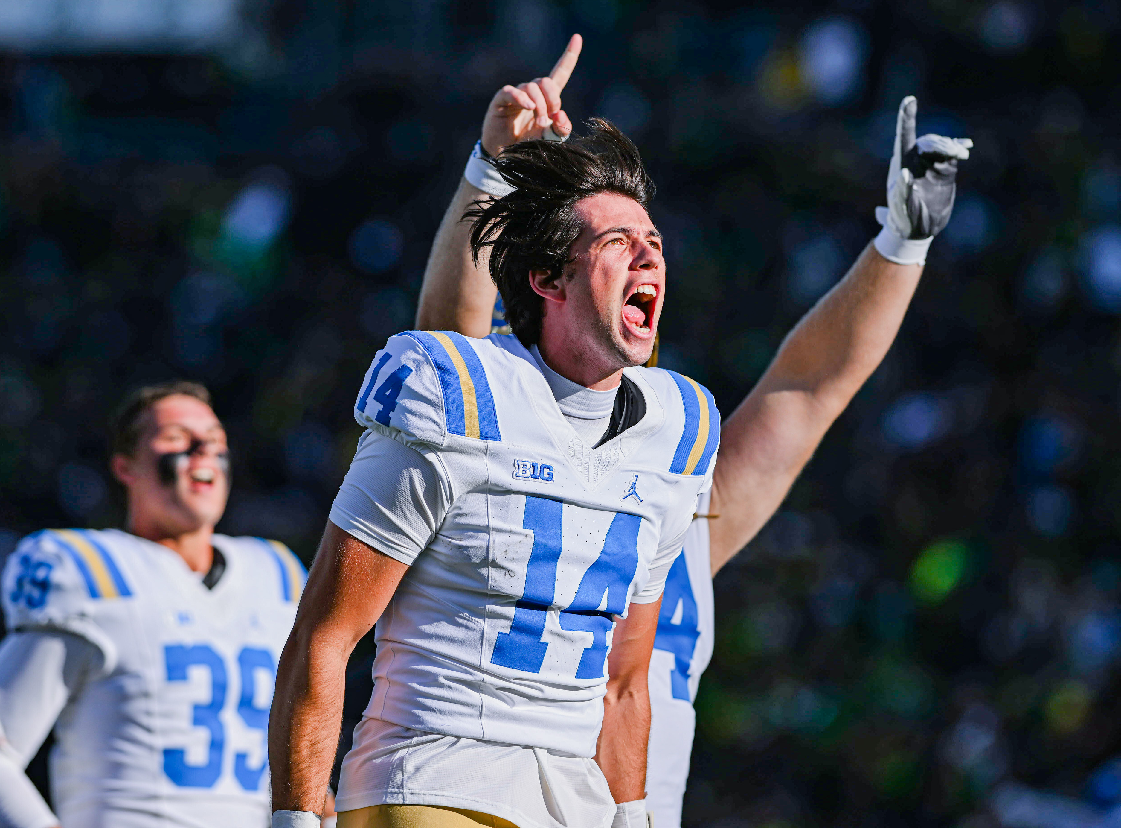 Dieffenbach screams after the game clock hits zero. Saturday was the quarterback's second appearance against a Power Four program and his first as a Bruin. (Bettina Wu/Daily Bruin senior staff)