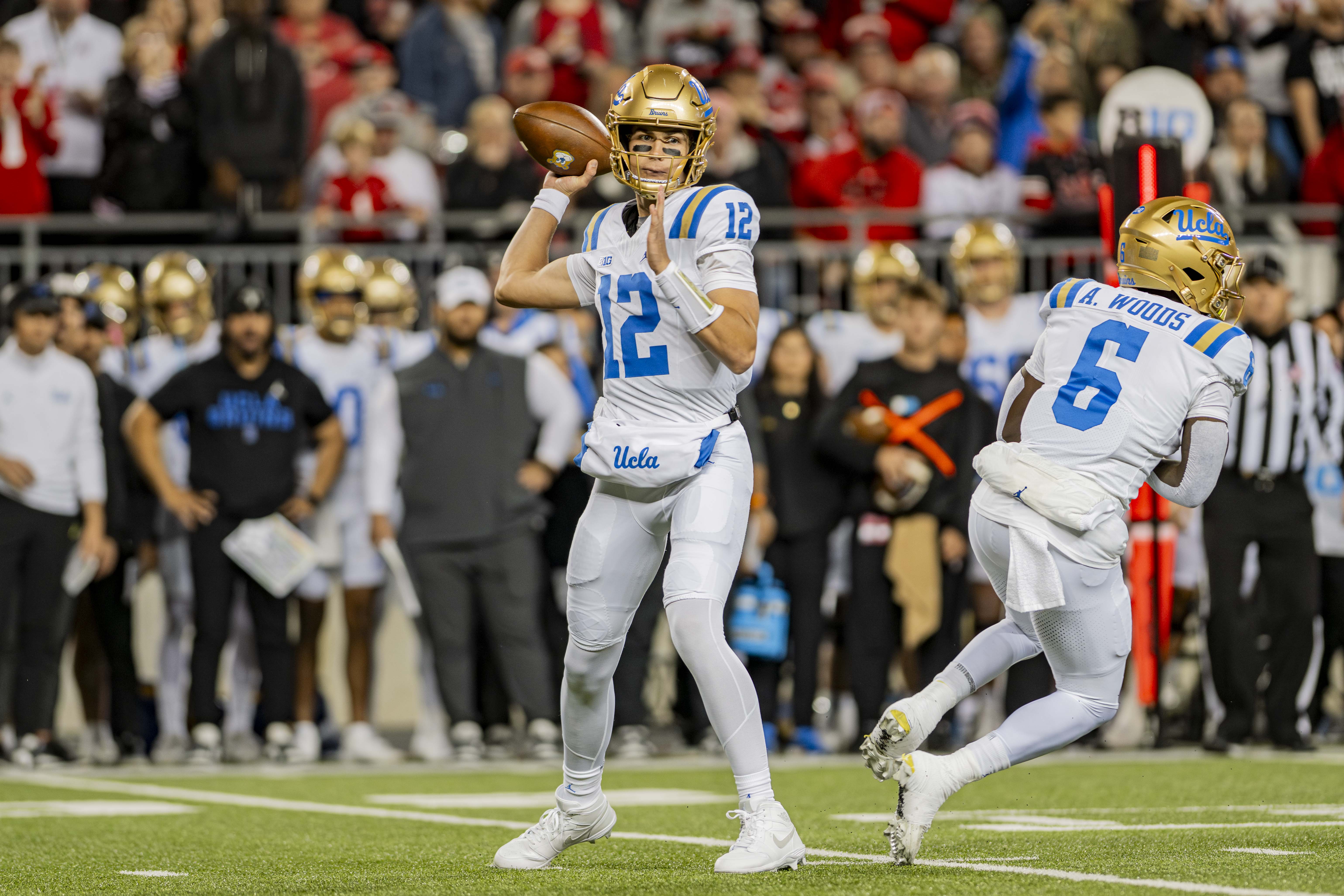 Former UCLA quarterback Luke Duncan brings the ball back in preparation for a pass. Duncan transferred to Nevada ahead of the 2026 season.