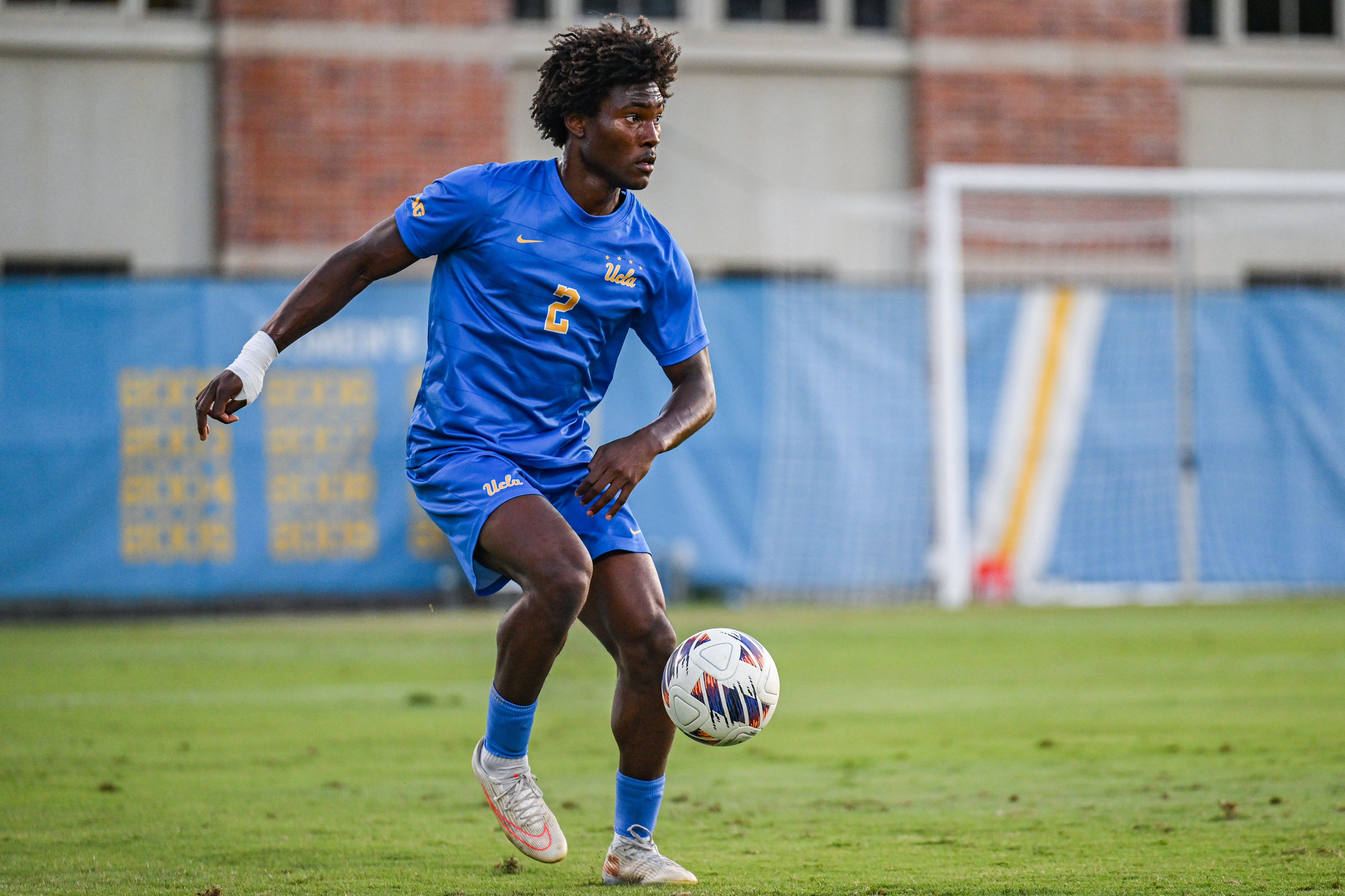 Junior defender Shakir Nixon dribbles the ball. Nixon leads UCLA in goals, recording five through the season, including a perfect four-for-four record from the penalty spot.
