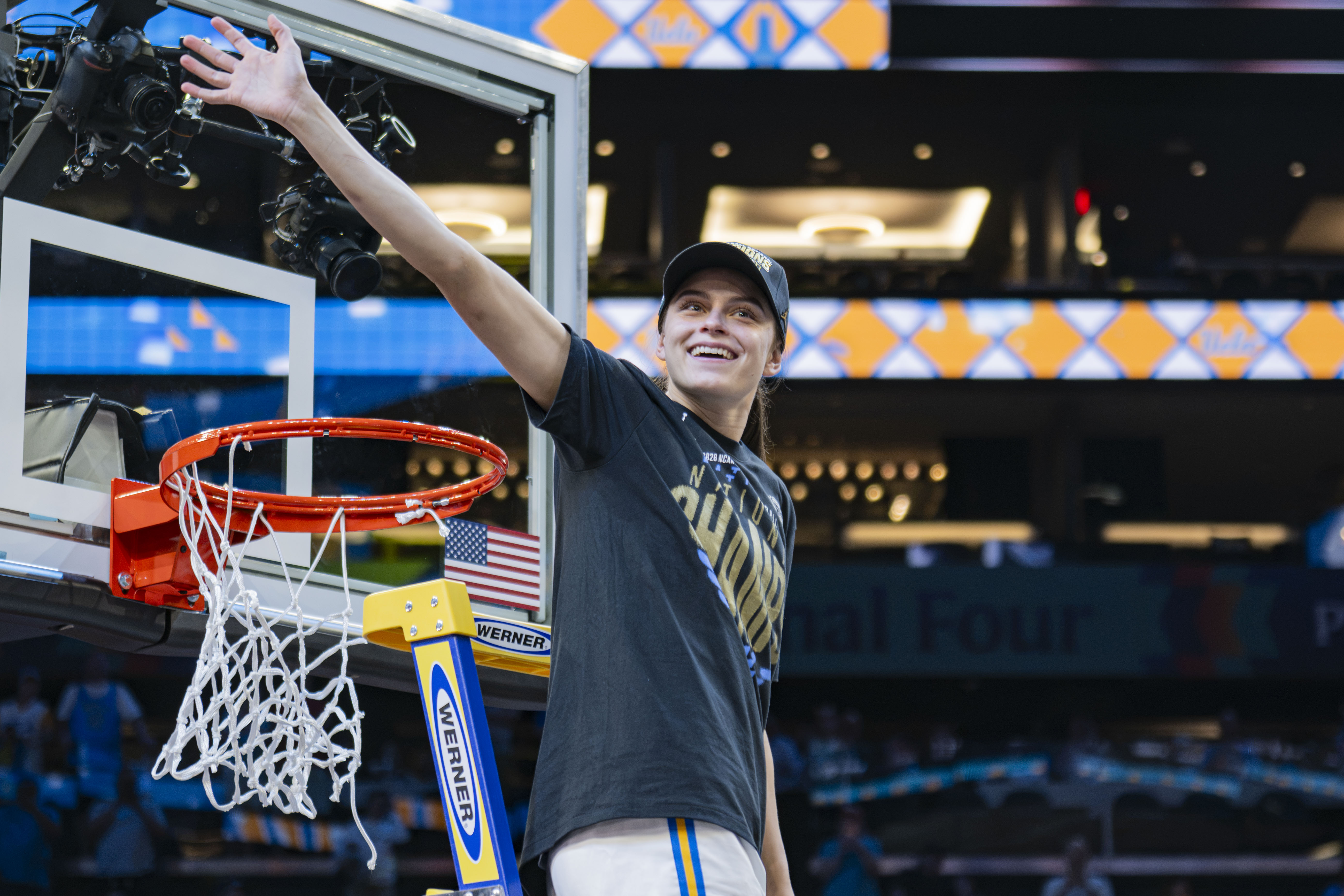 Former Bruin guard Gabriela Jaquez waves to the crowd while cutting down the National Championship net. Jaquez spent four seasons with UCLA before being drafted fifth overall by the Chicago Sky. (Daily Bruin file photo)