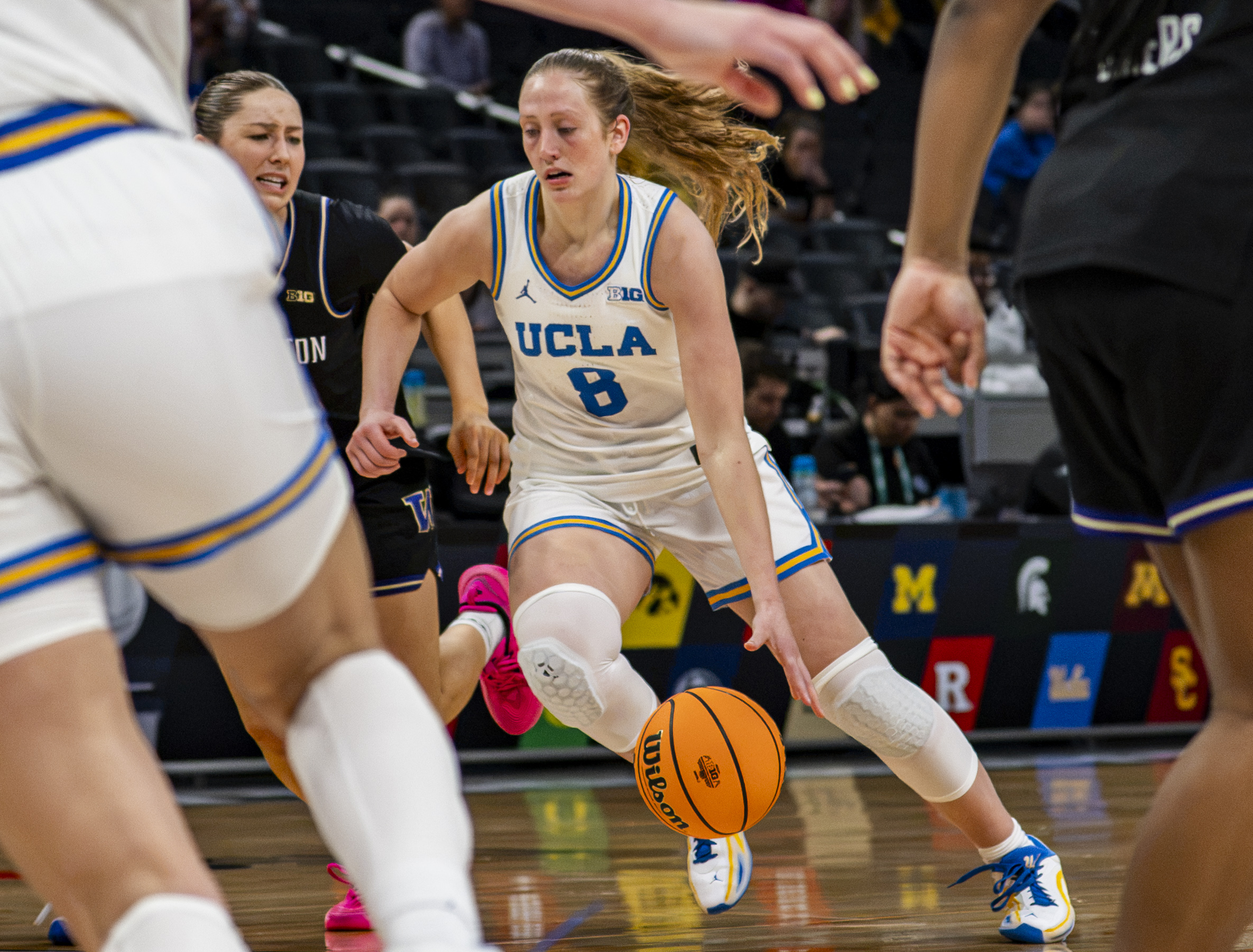 Former Bruin guard Gianna Kneepkens dribbles the ball in the 2026 Big Ten Tournament. Kneepkens spent her senior campaign with UCLA and was selected as the last pick in the first round of the 2026 WNBA Draft. (Daily Bruin file photo)