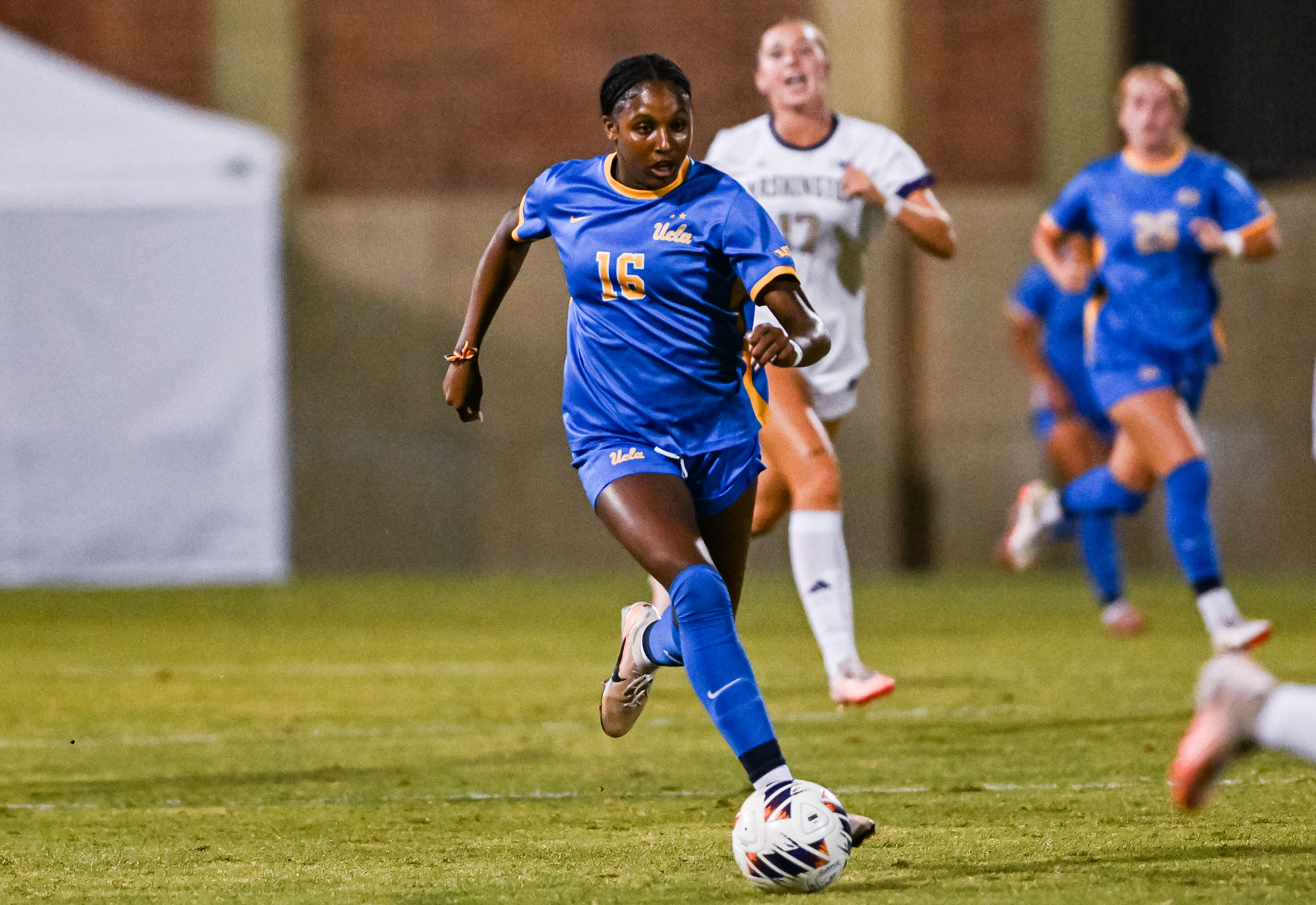Sophomore forward Leena Powell dribbles the ball. Powell recorded her first assist of the season Sunday. (Bettina Wu/Daily Bruin senior staff)