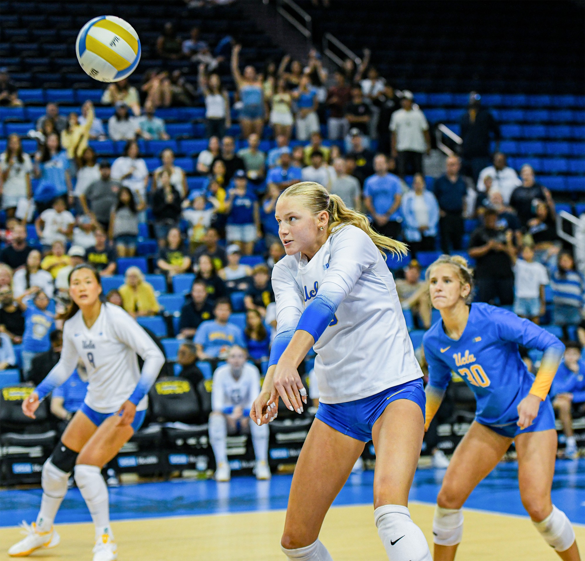 Sophomore right-side hitter Mija Bendziute digs the ball. The Boca Raton, Florida, local had a career-high 14 kills against Maryland and season-highs of six blocks and four aces. (Pranav Akella/Daily Bruin staff)